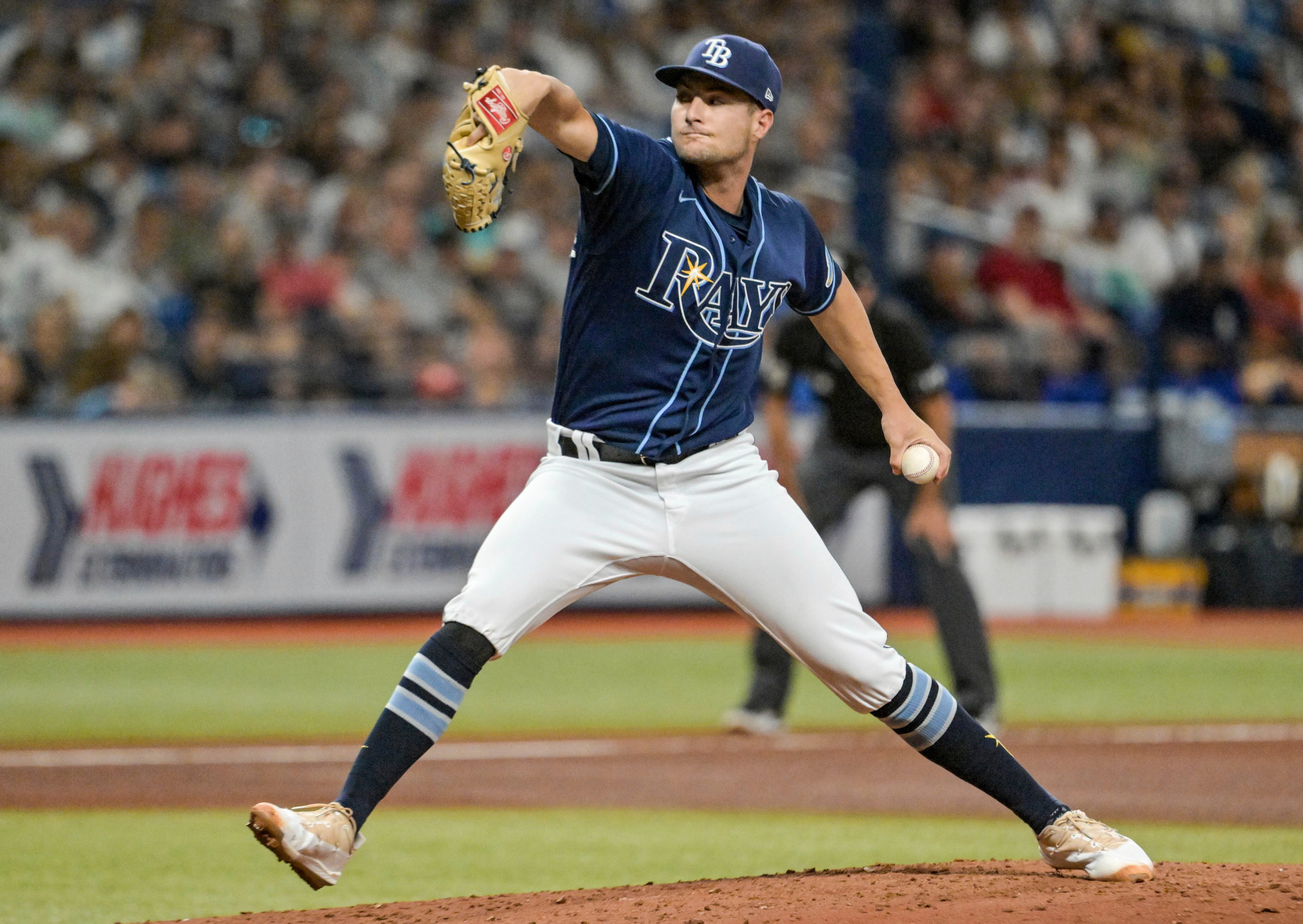 Yanks beat Rays 4-2 behind Cole, Hicks, 1st team to 50 wins