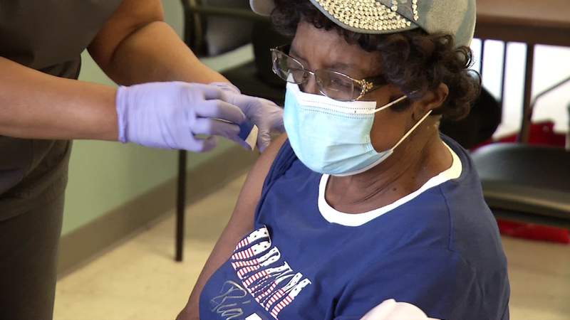 ‘Time to end this pandemic’: Community health fair encourages vaccinations