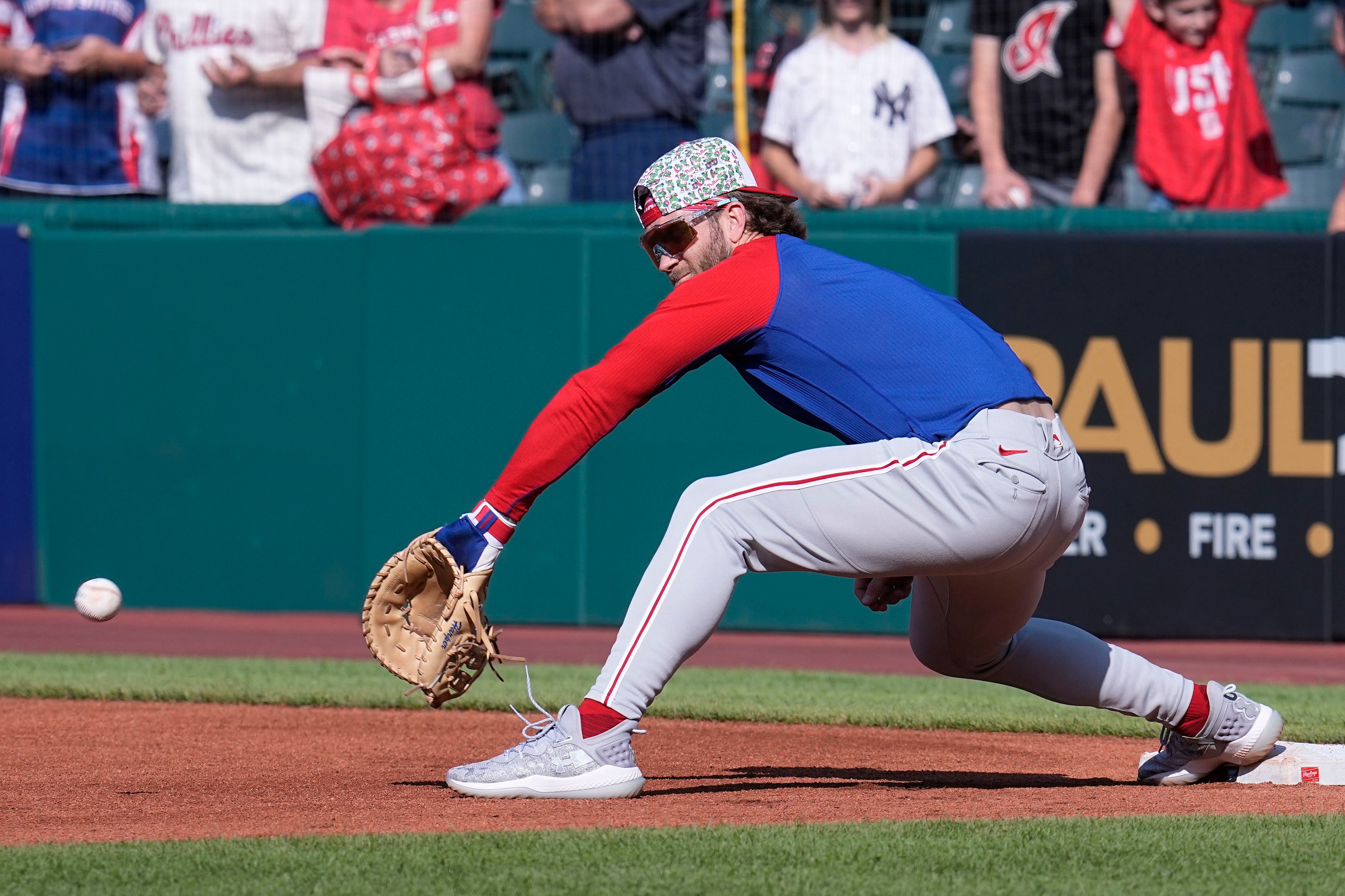 PHILADELPHIA, PA - SEPTEMBER 27: Philadelphia Phillies Outfield Bryce Harper  (3) squats frustrated at first base after being tagged out during the Miami  Marlins game versus the Philadelphia Phillies on September 27