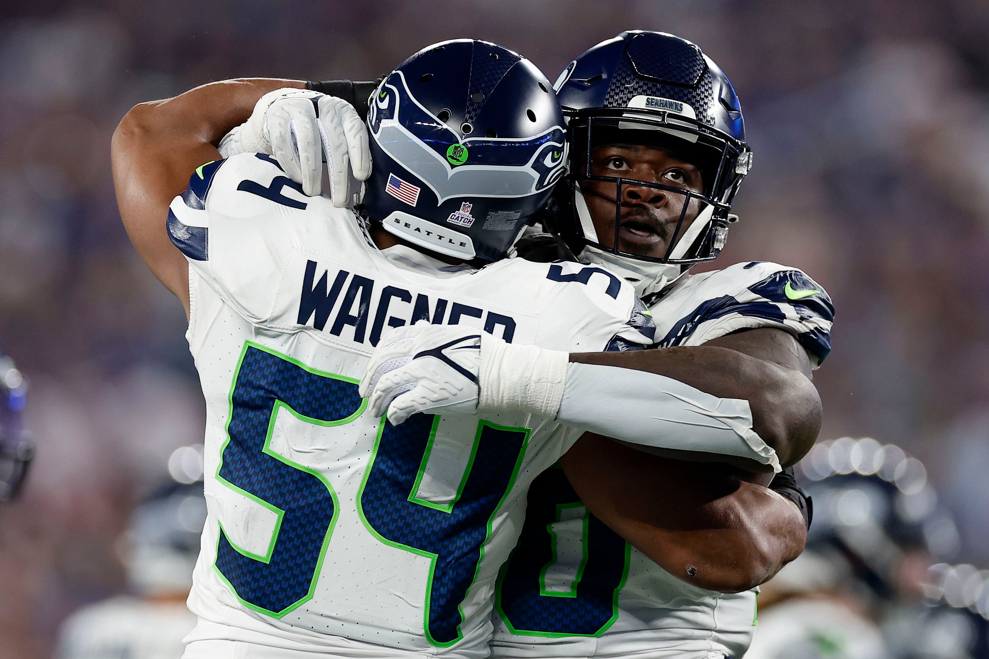 Rookie Devon Witherspoon scores on 97-yard pick-6 as Seahawks' defense  leads Seattle over Giants