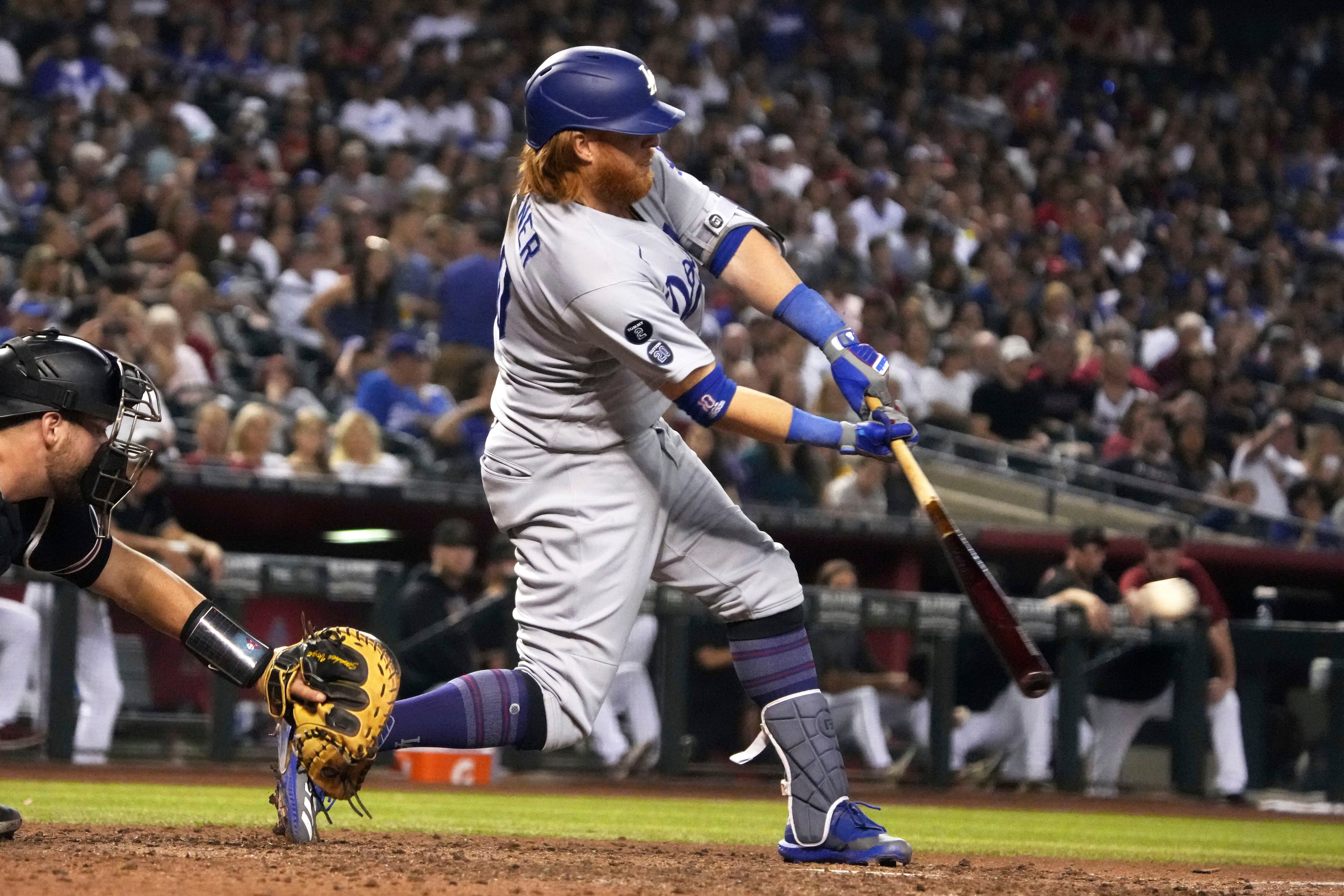 Buehler takes no-hitter into 8th, Dodgers beat D-backs 9-3