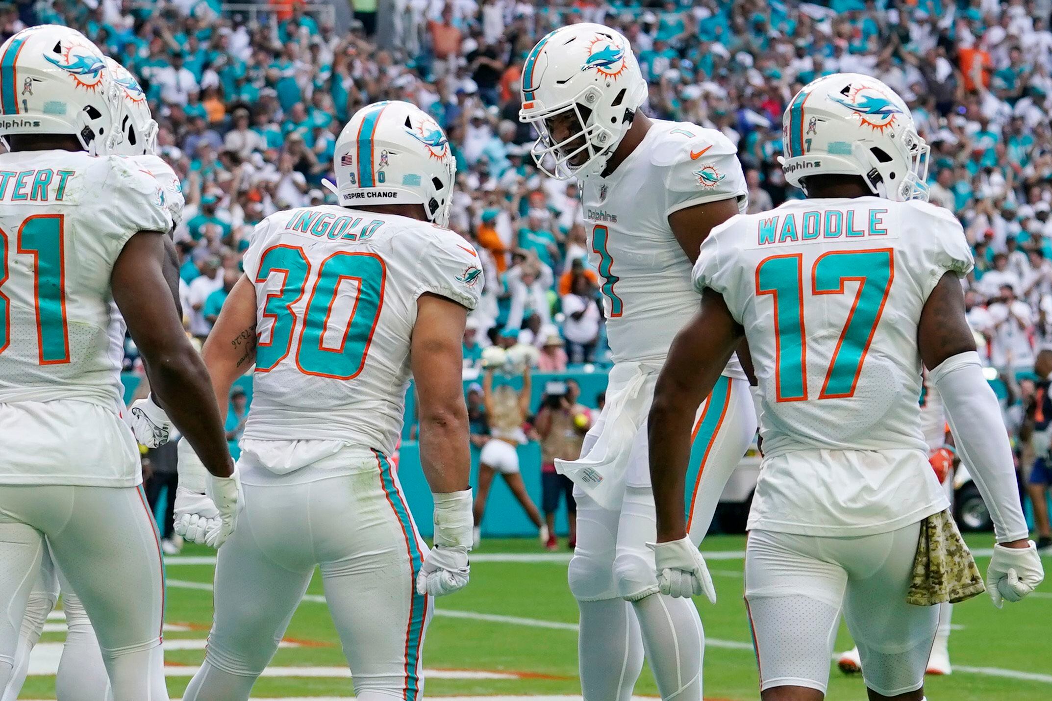 CBS Sports sideline reporter AJ Ross interviews Miami Dolphins quarterback  Tua Tagovailoa (1) on the field after the Dolphins defeated the Cleveland  Browns during an NFL football game, Sunday, Nov. 13, 2022