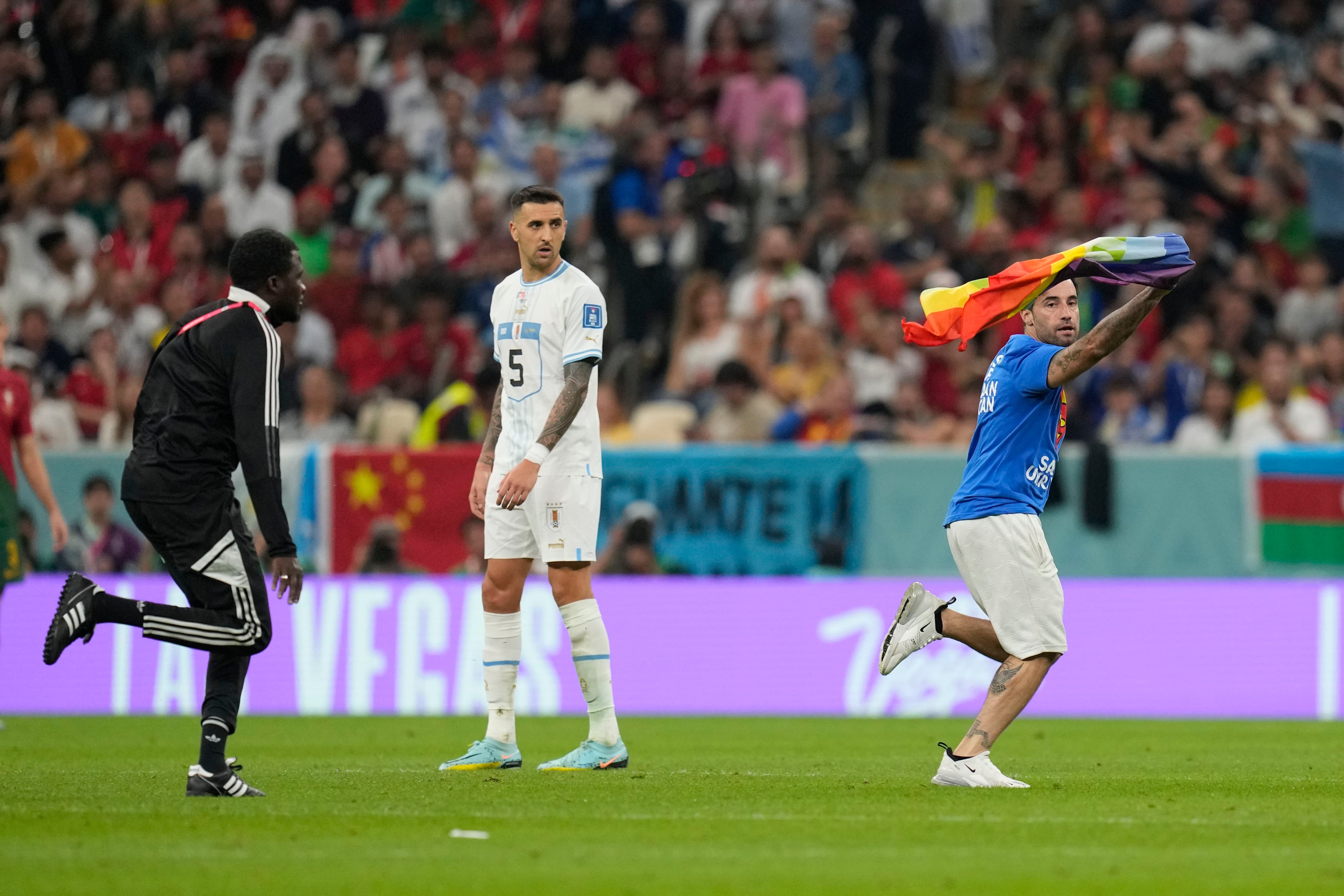 Respect For Iranian Women' protester invades pitch at World Cup