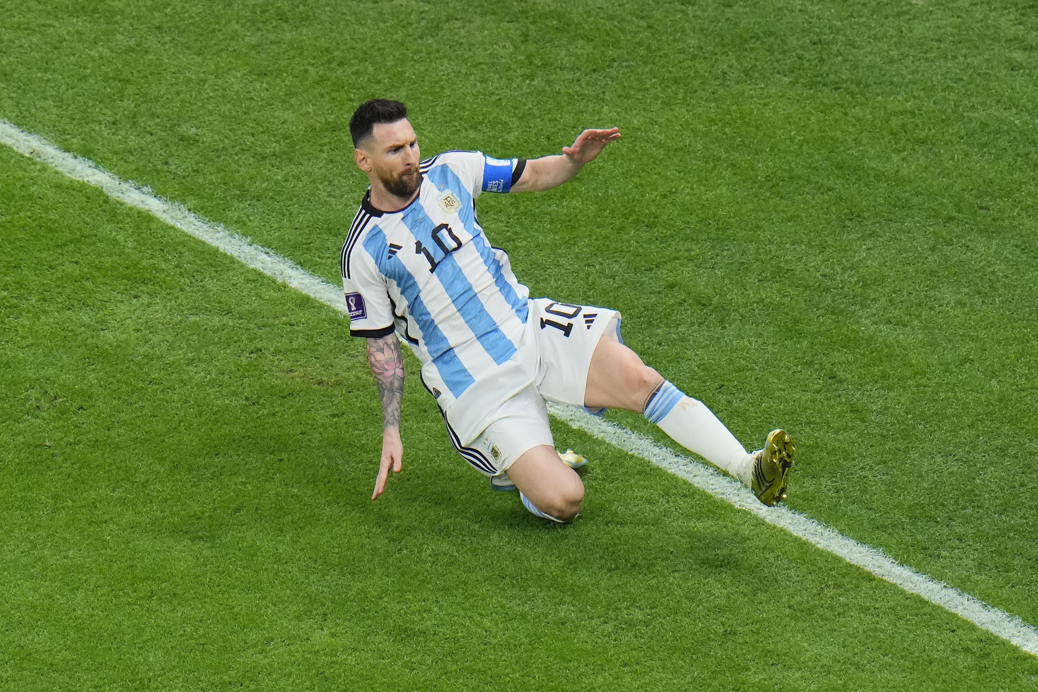 Lionel Messi: a sky blue & white striped Argentina No.15 jersey