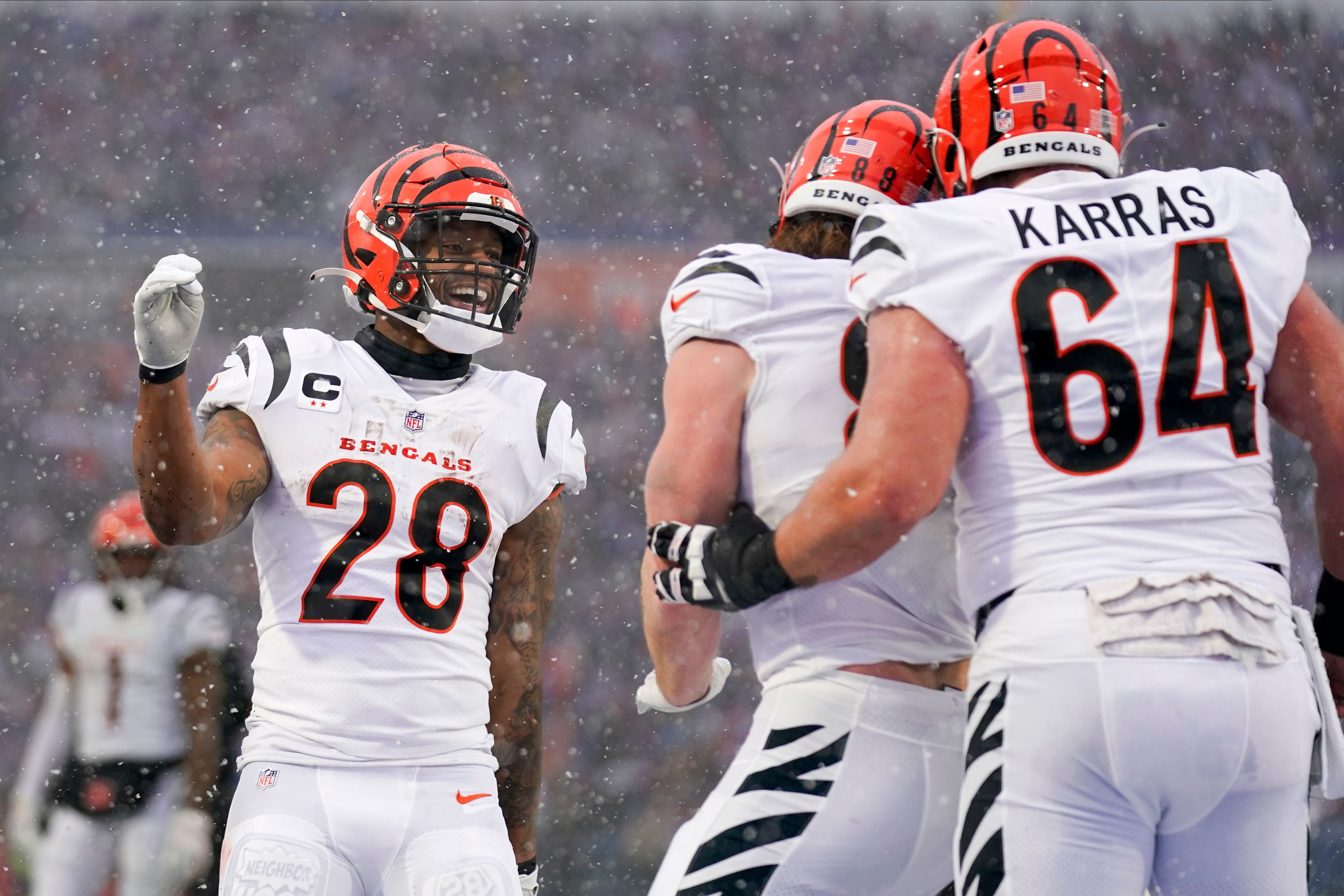 Cincinnati Bengals tight end Hayden Hurst (88) walks to the locker room  with teammates after Buffalo Bills Damar Hamlin was injured during the  first half of an NFL football game, Monday, Jan.