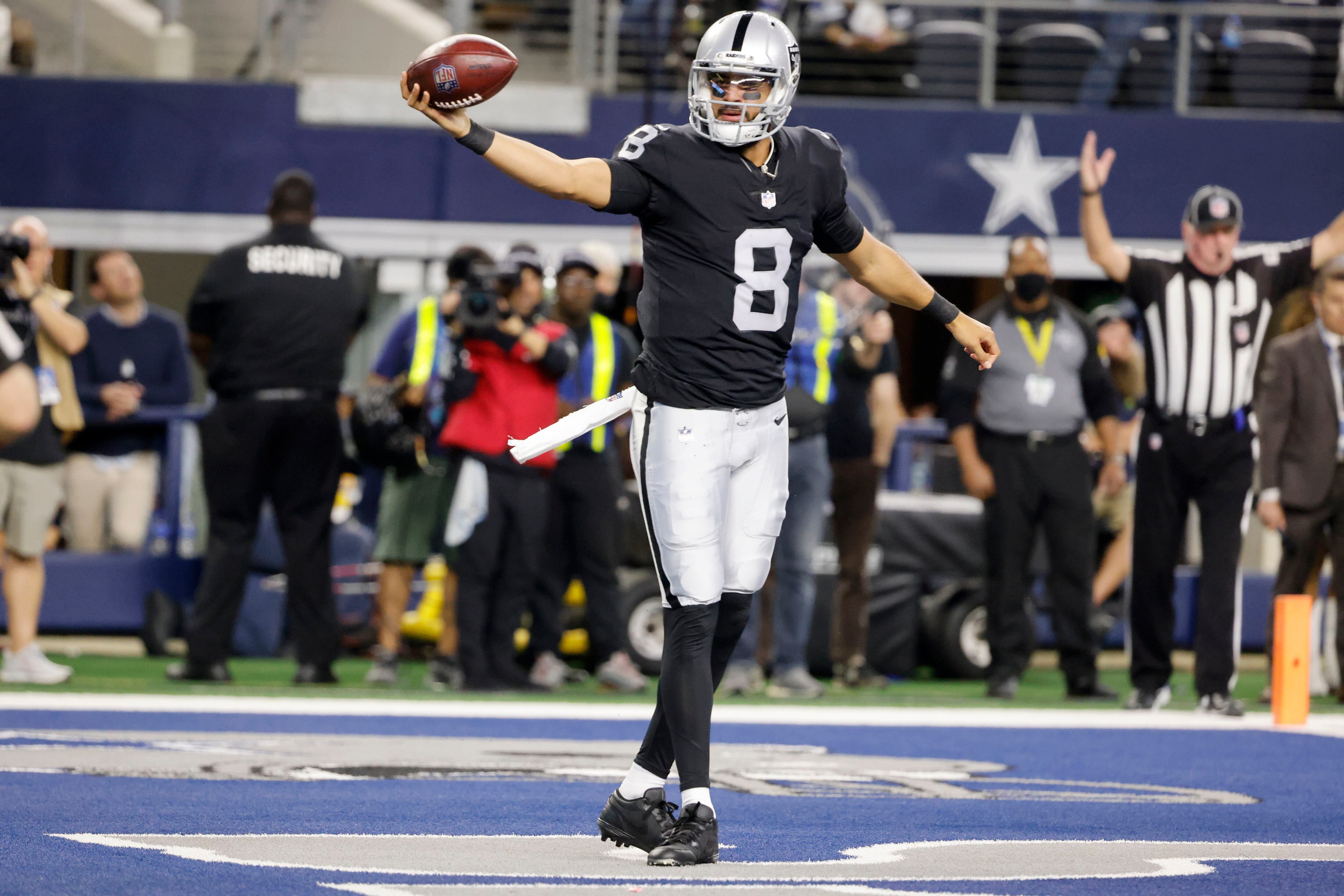 Dallas Cowboys defensive end Dorance Armstrong (92) gives chase as Las  Vegas Raiders quarterbac …