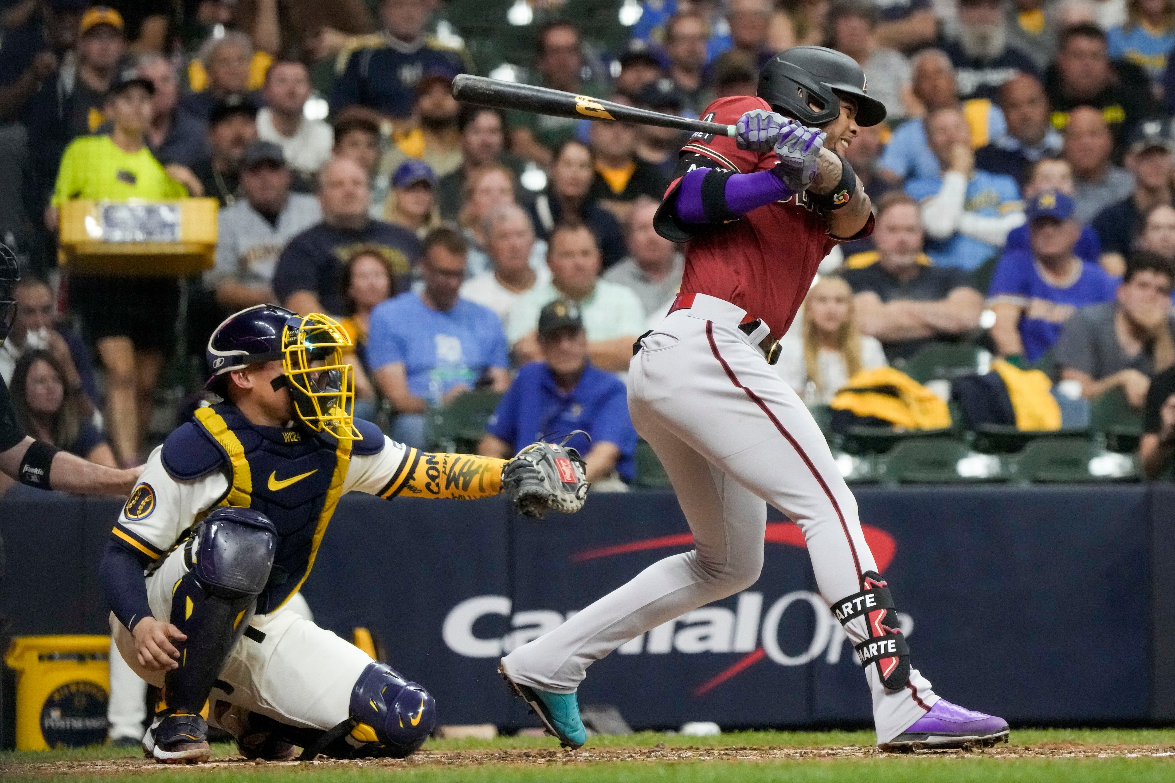 Milwaukee Brewers' William Contreras celebrates after hitting a home run  during the fourth inning of a baseball game against the Los Angeles Dodgers  Wednesday, May 10, 2023, in Milwaukee. (AP Photo/Morry Gash