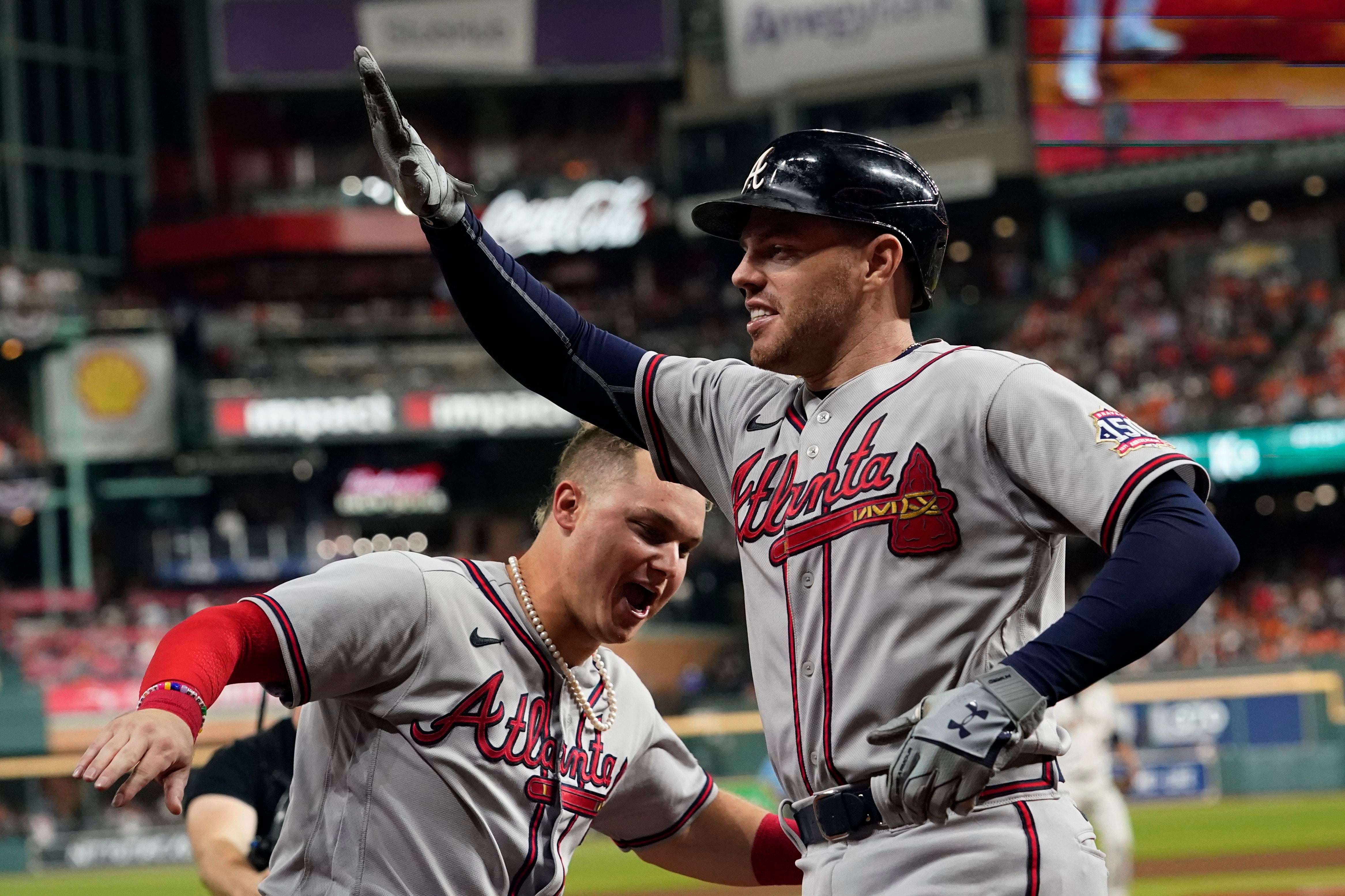 Heartwarming Moment: Freddie Freeman Embracing Dansby Swanson