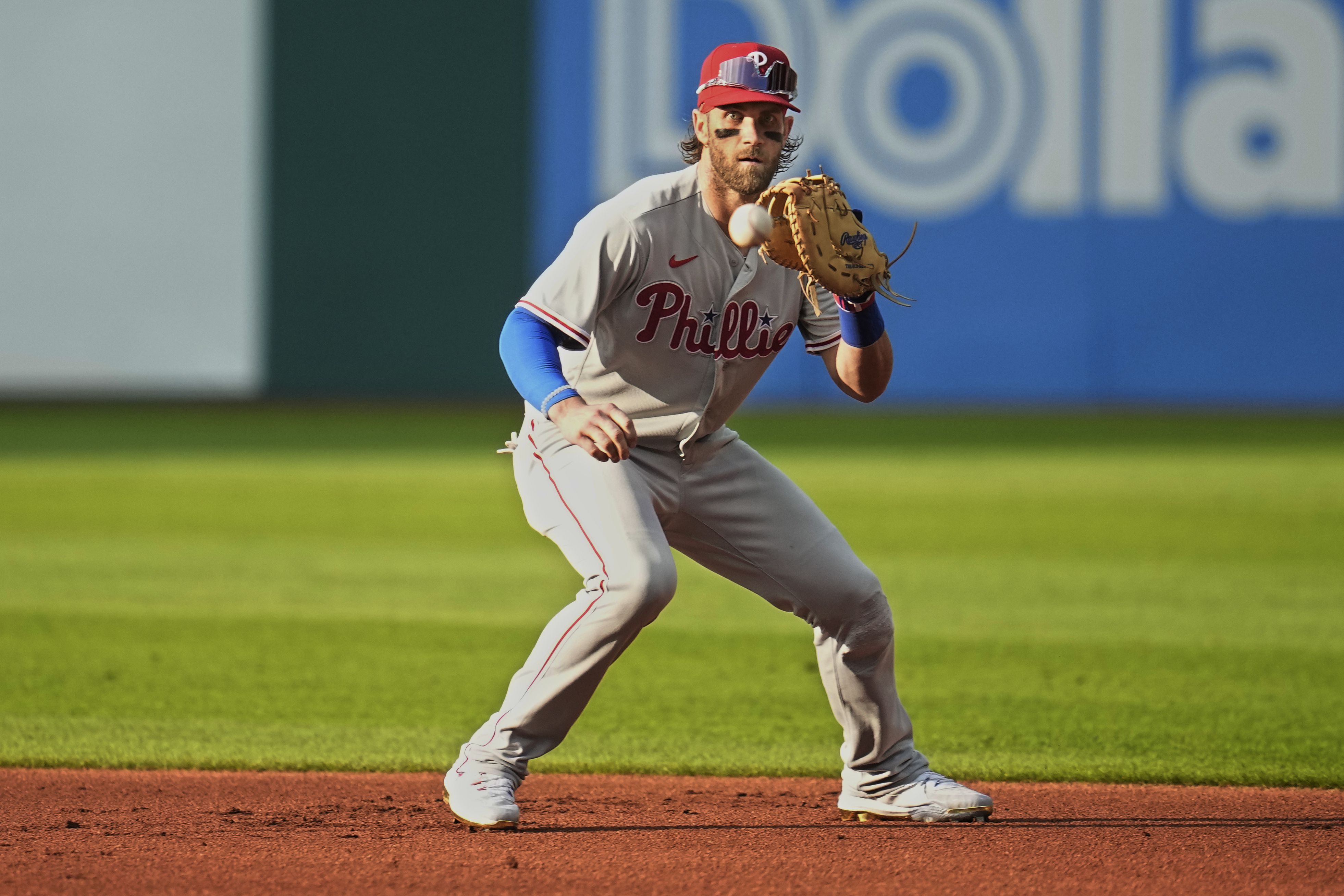 PHILADELPHIA, PA - SEPTEMBER 27: Philadelphia Phillies Outfield Bryce Harper  (3) squats frustrated at first base after being tagged out during the Miami  Marlins game versus the Philadelphia Phillies on September 27