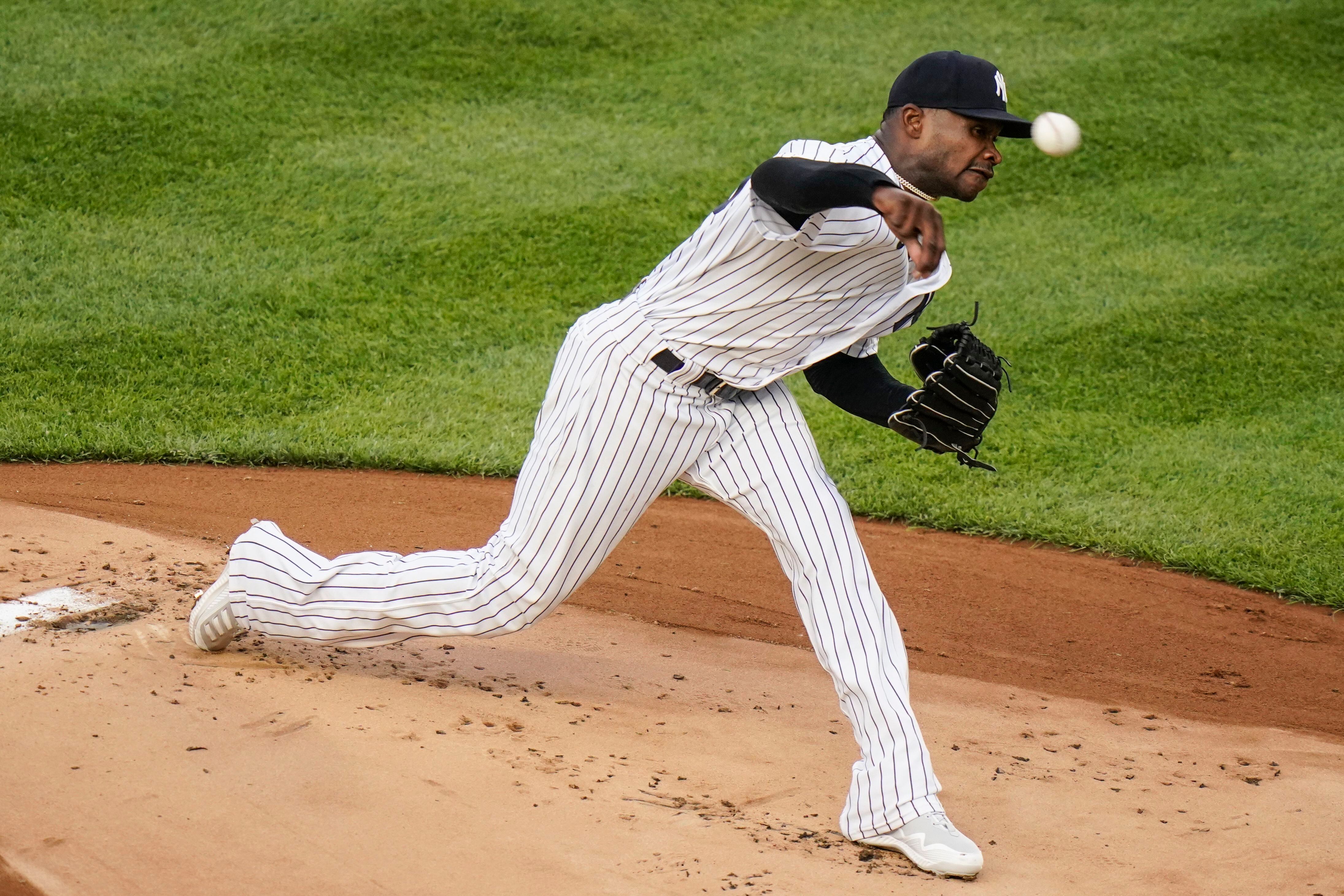 New York Yankees designated hitter Giancarlo Stanton (27) prepares to swing  at a pitch during the eighth inning of a MLB baseball game against Tampa  Bay Rays, Tuesday June 14, 2022, in