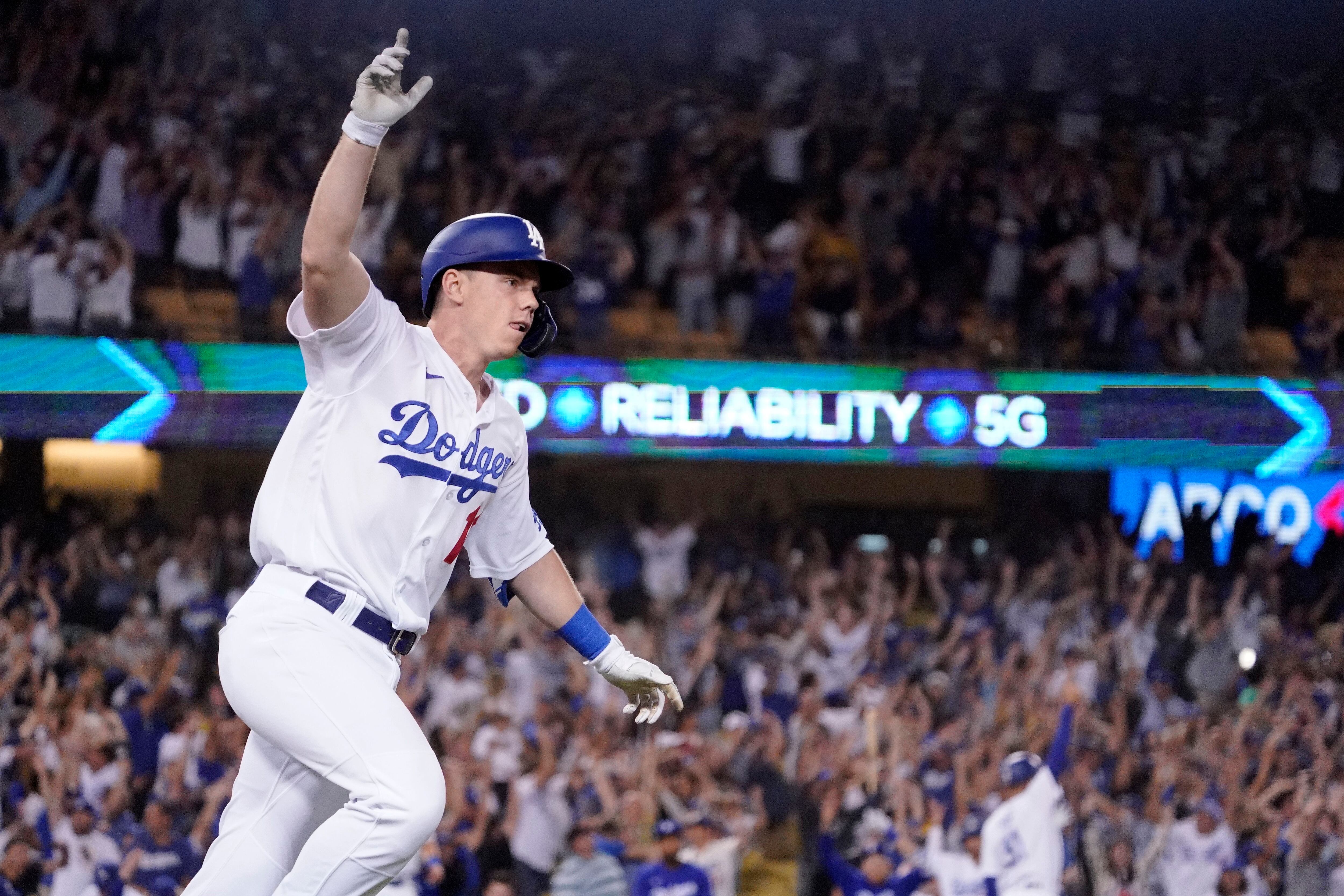 LOS ANGELES, CA - APRIL 03: Los Angeles Dodgers Shortstop Corey Seager (5)  hits a three run home run in the bottom of the 5th inning during an MLB  opening day game