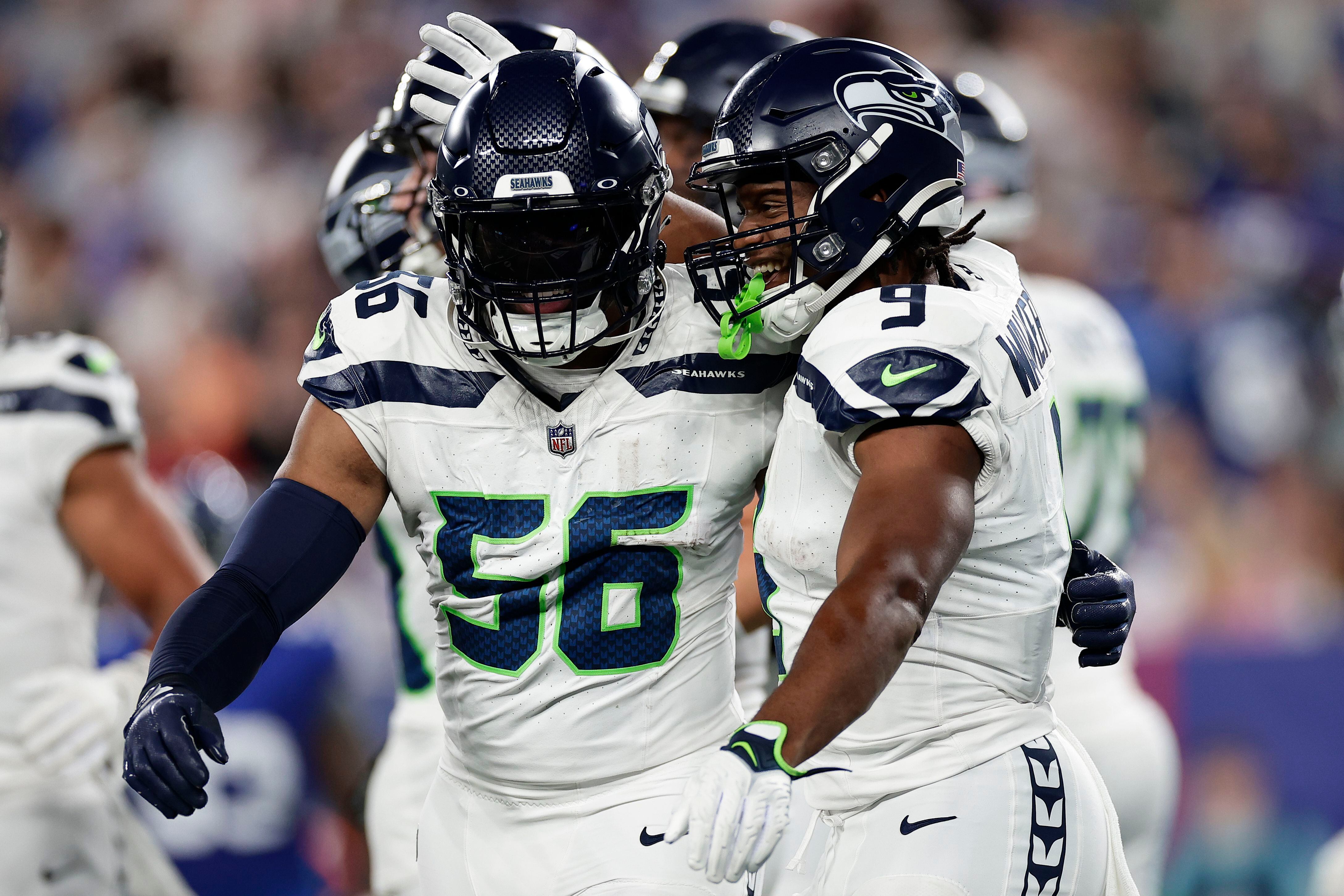 Devon Witherspoon pick-six, team record 11 sacks carry Seahawks to 24-3 win  over Giants