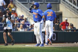 MCWS: Ty Evans' Grand Slam Lifts Florida to Record-Breaking 24-4