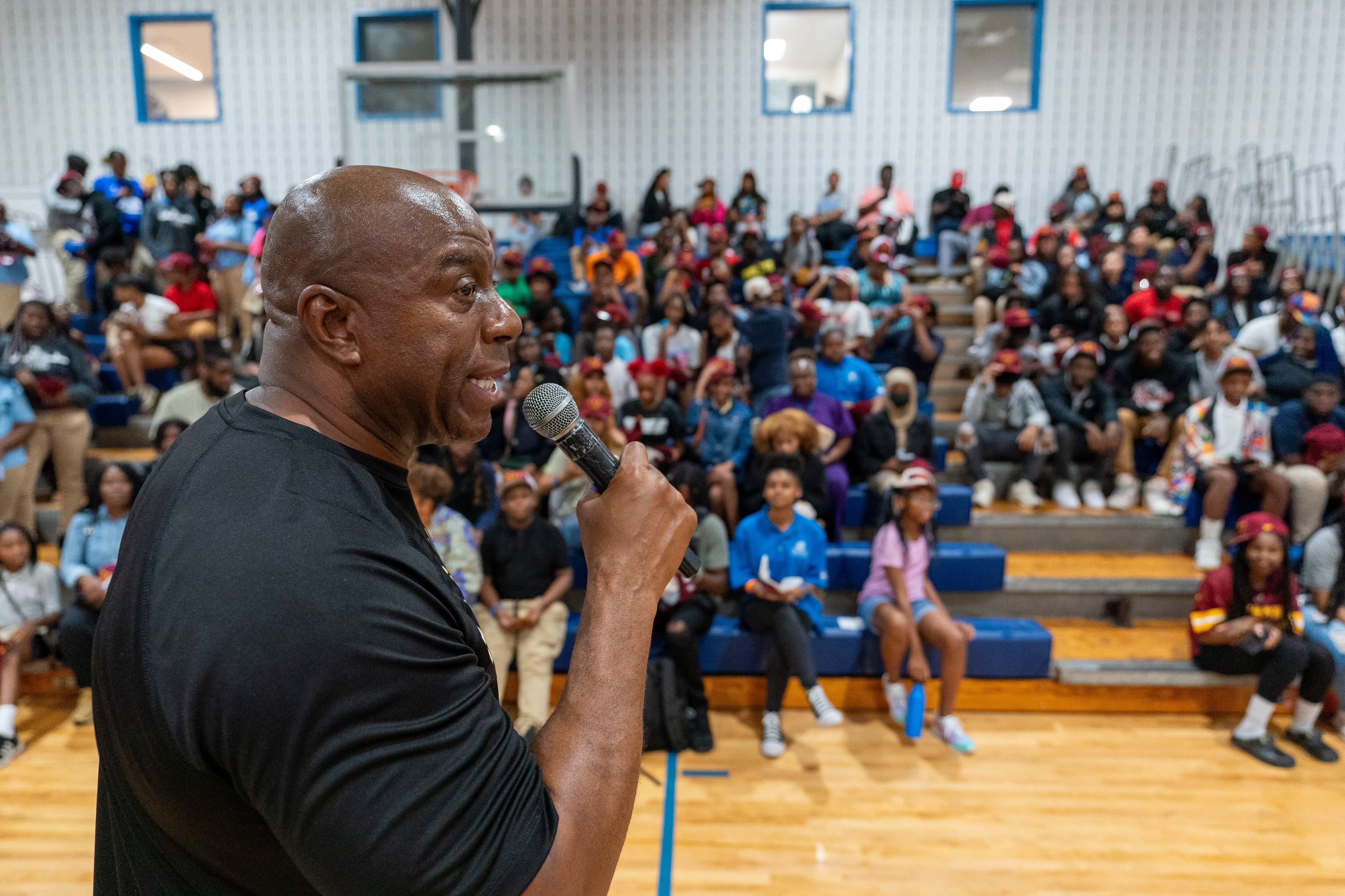 Magic Johnson, Josh Harris and other new Commanders owners introduce  themselves to Washington fans