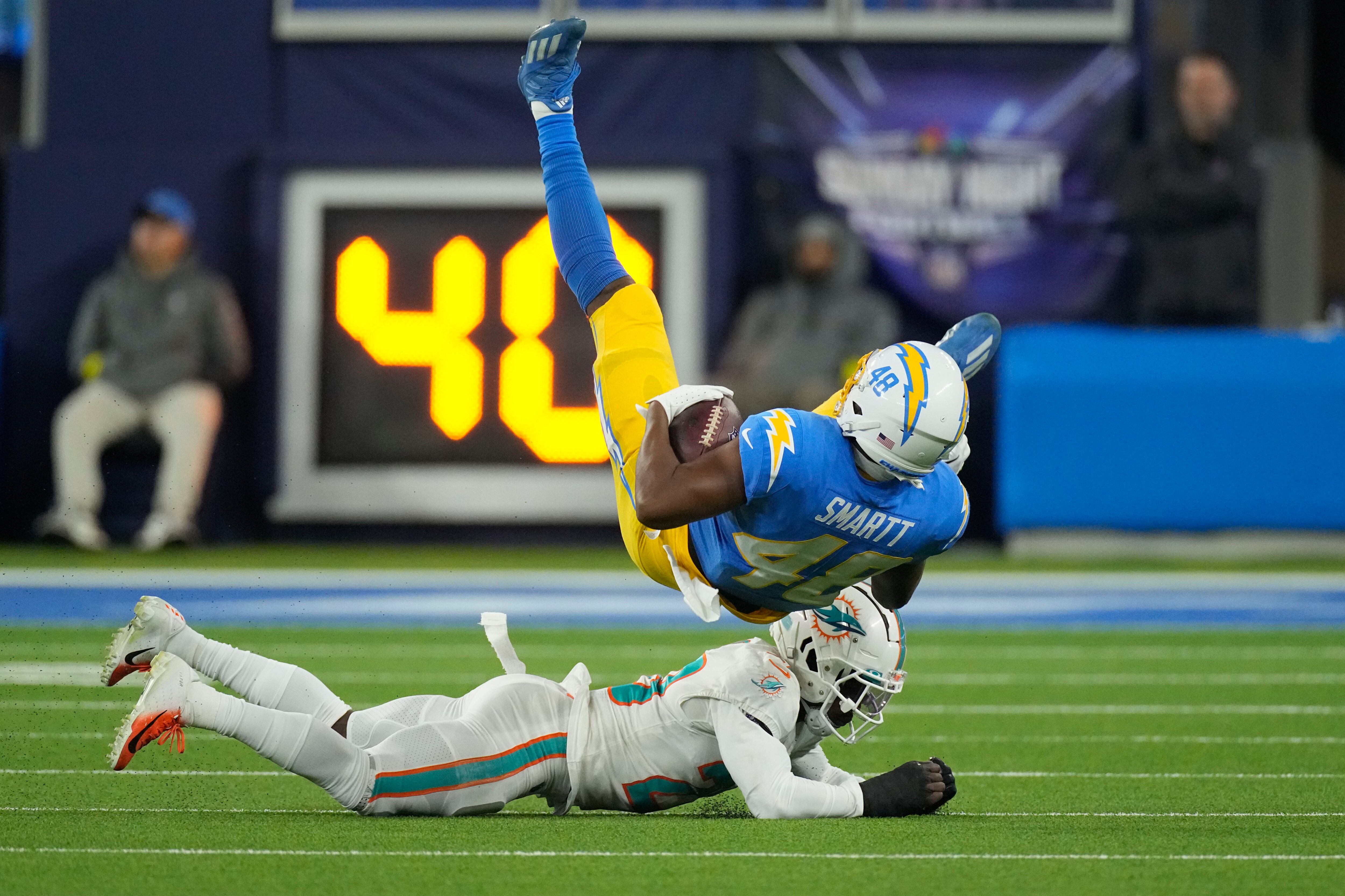 Herbert, short-handed defense lead Chargers past Fins 23-17