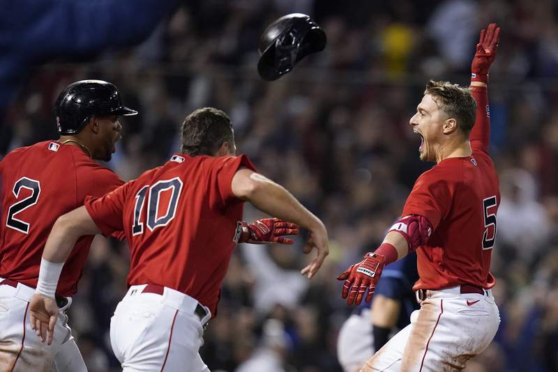 Cole, Carpenter send Yanks over Red Sox 13-2; Sale breaks finger