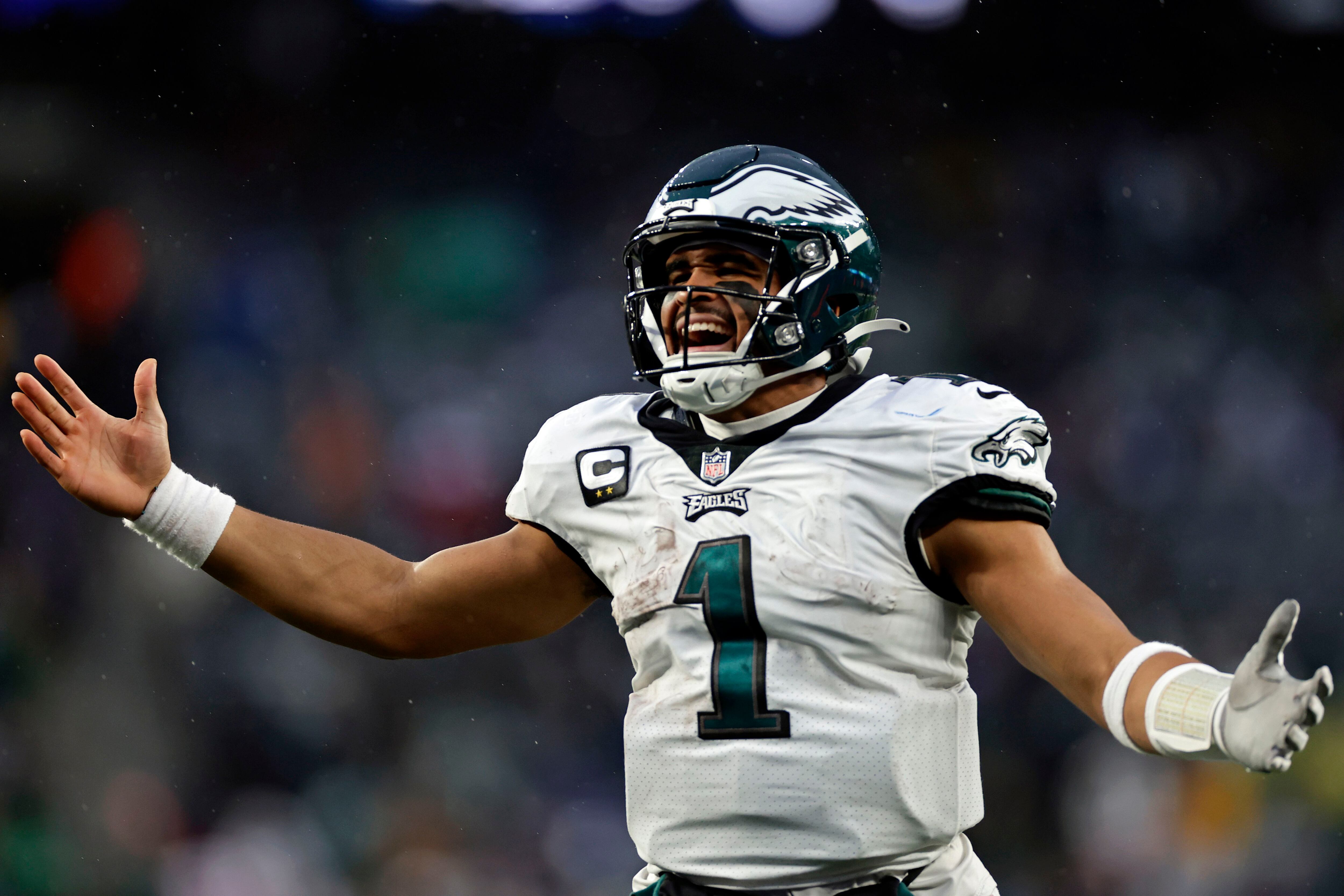 Philadelphia Eagles wide receiver A.J. Brown (11) and quarterback Jalen  Hurts (1) talk after an NFL