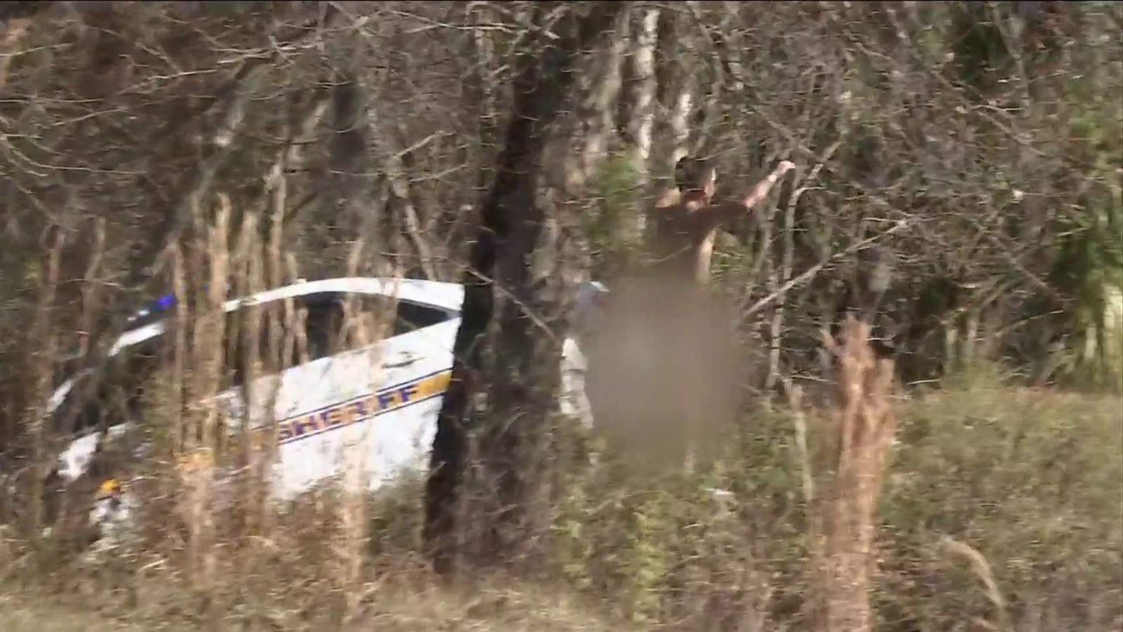 Naked man driving stolen JSO cruiser crashes into woods on I-10