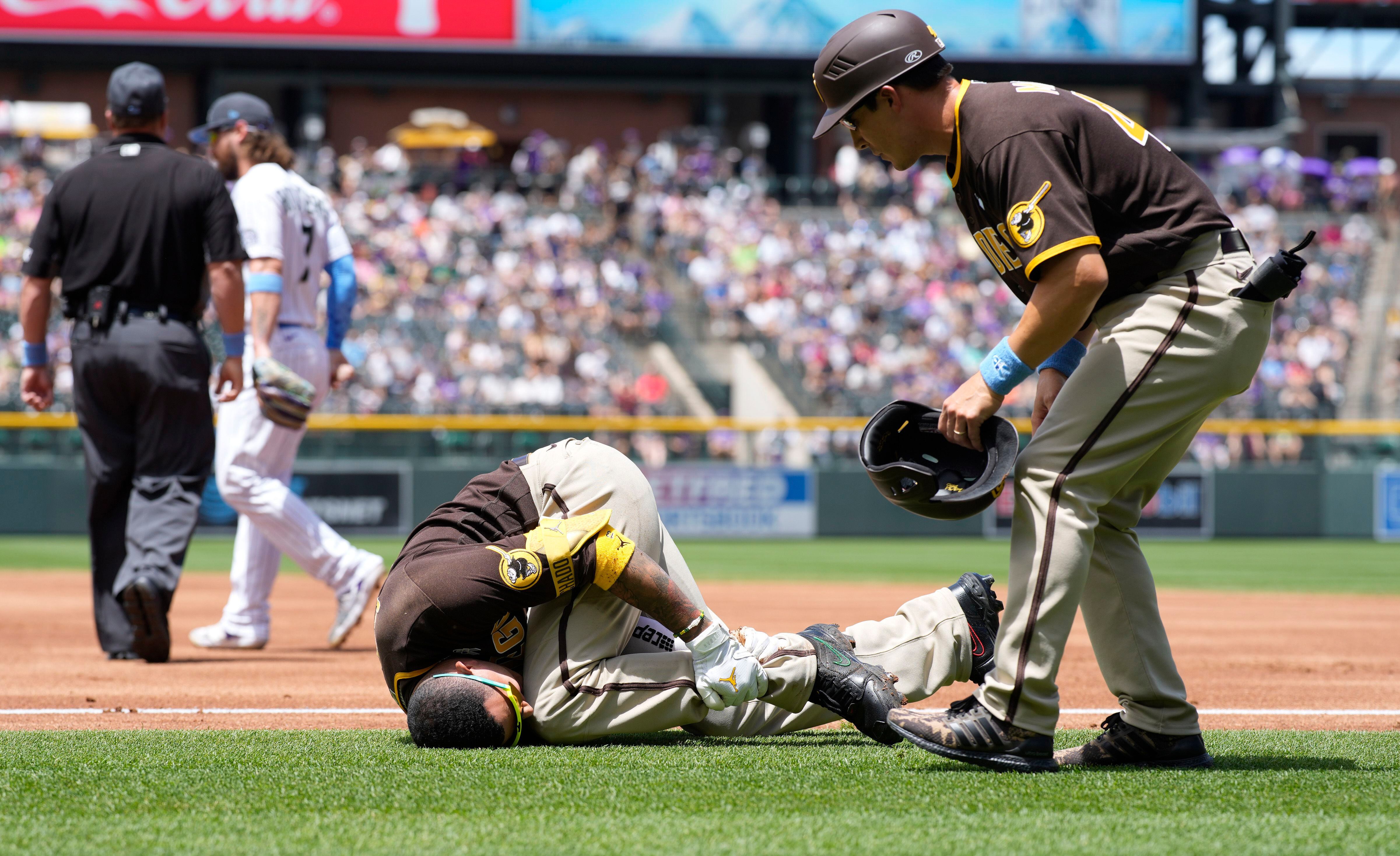 Padres slugger Machado headed to injured list with fractured left hand