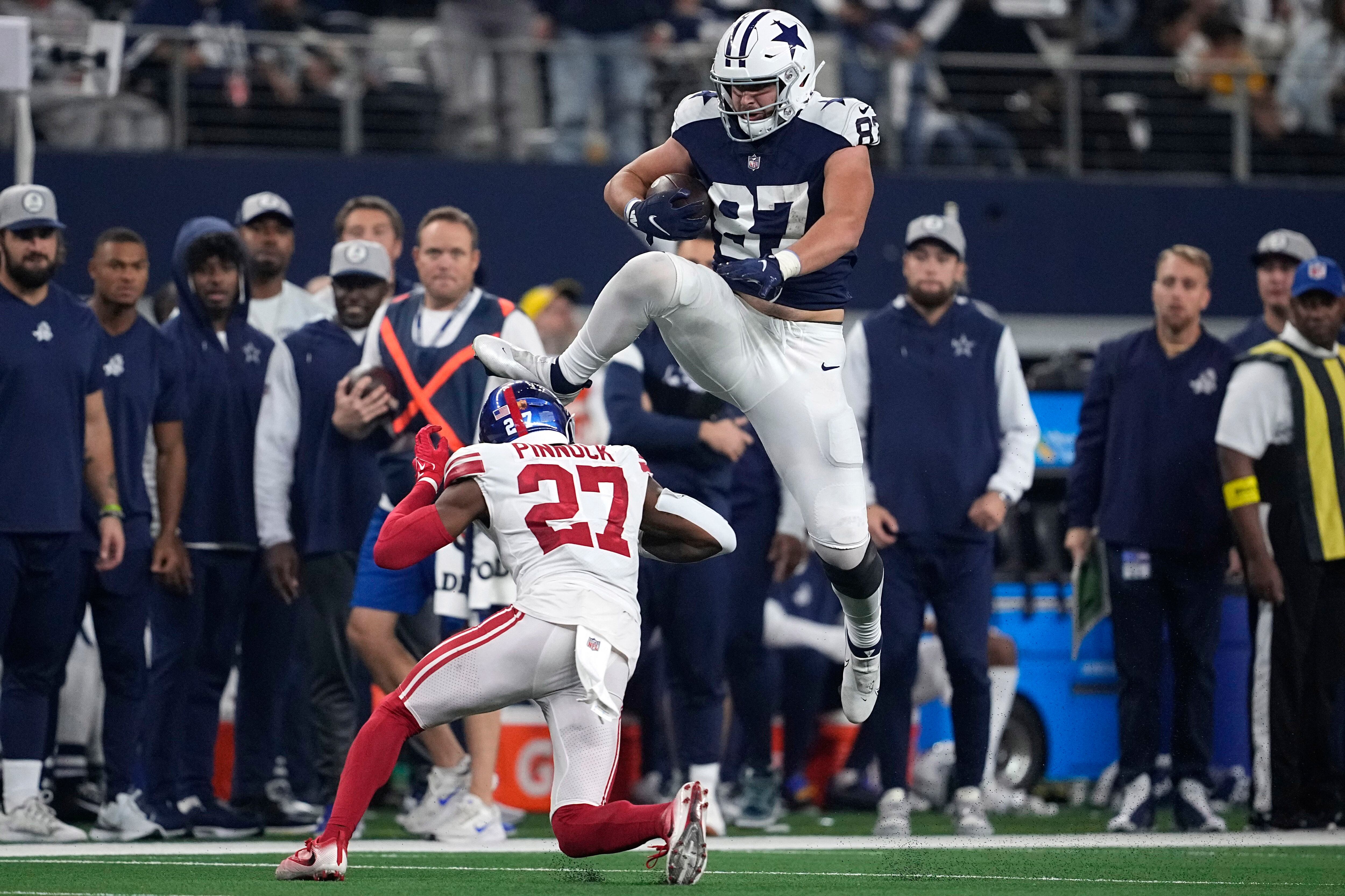 WATCH: Prescott jumps in Salvation Army Red Kettle After Remarkable  Touchdown Run