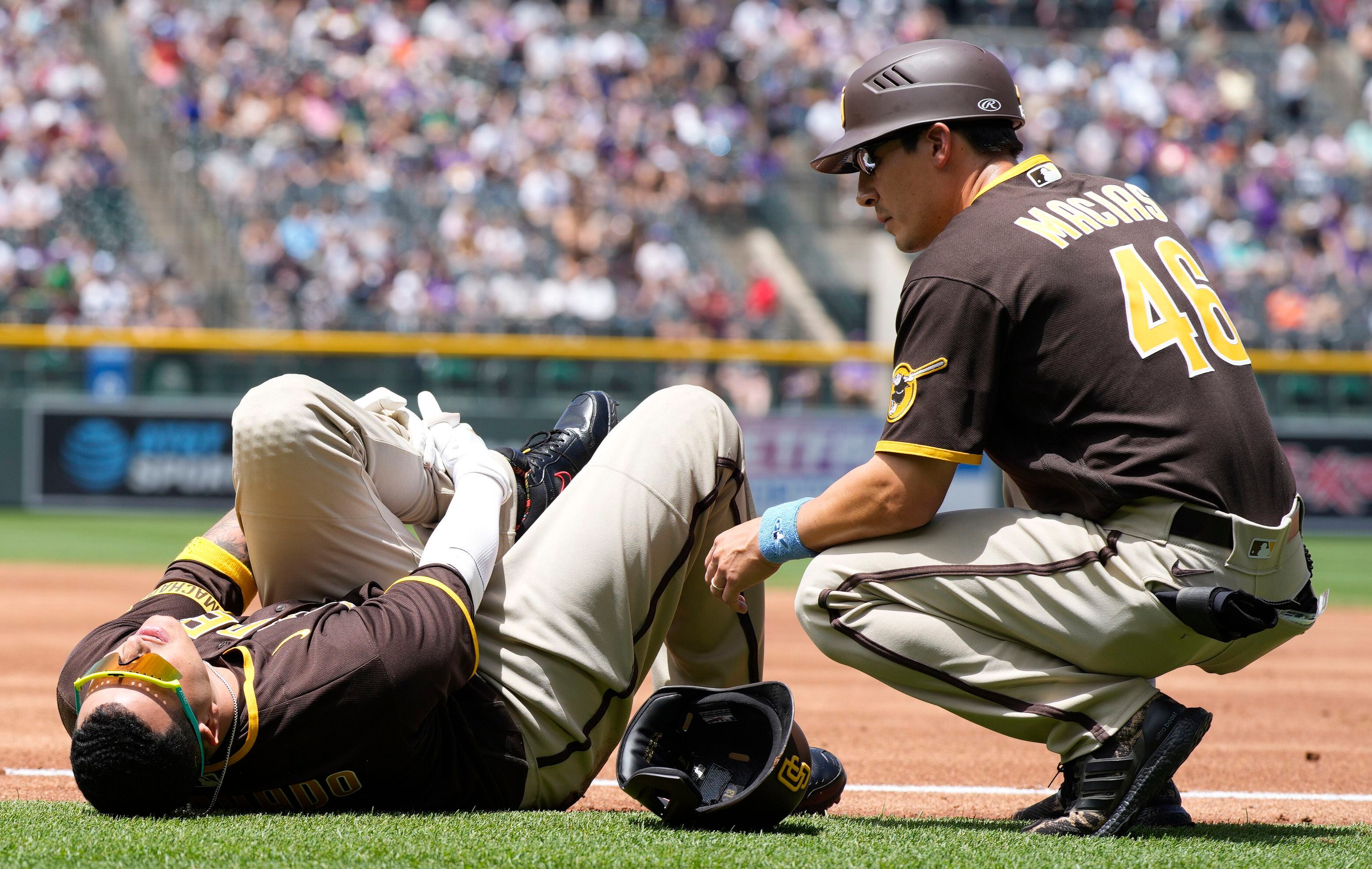 Padres slugger Machado headed to injured list with fractured left hand