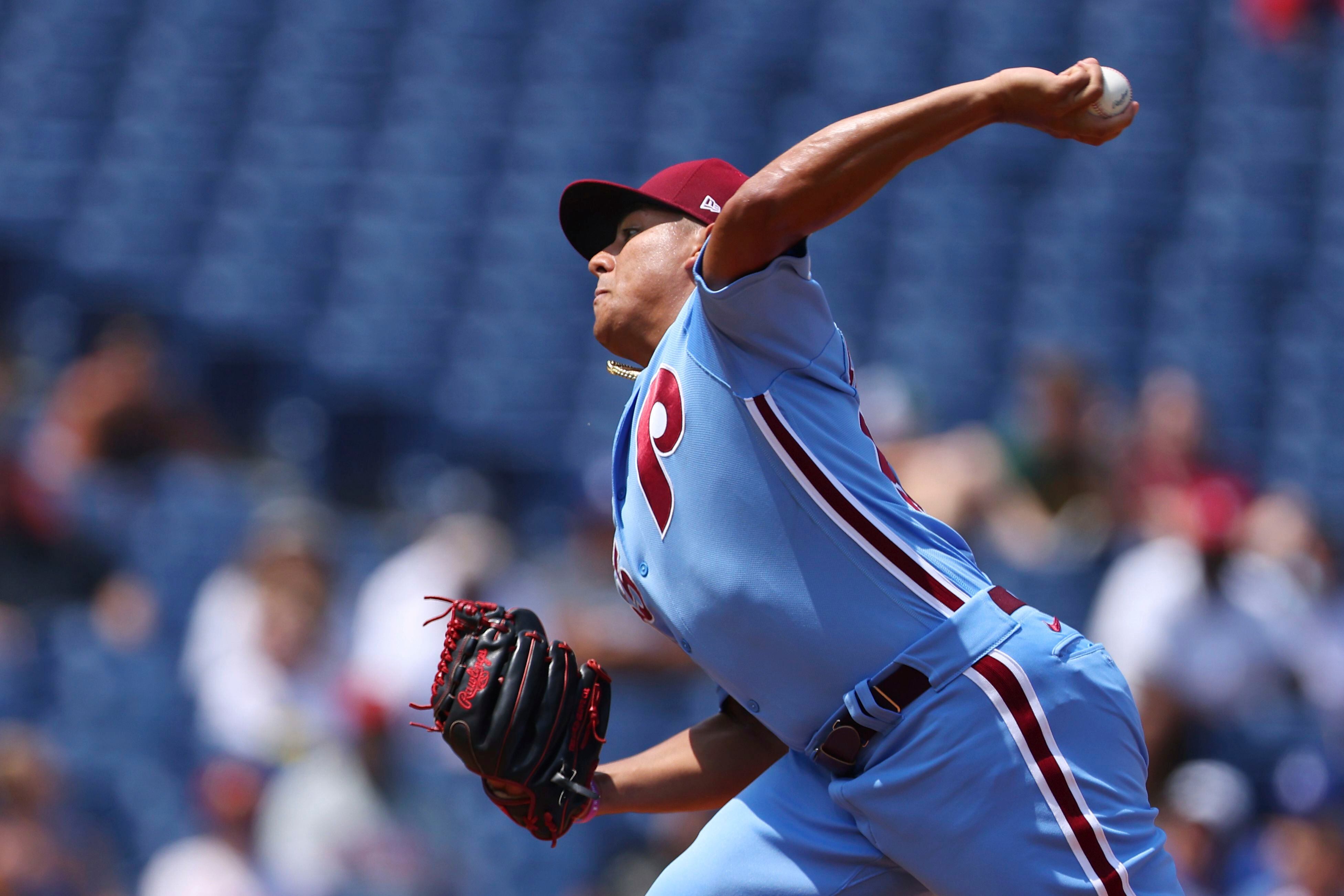 Phillies catcher Realmuto leaves after foul tip to mask