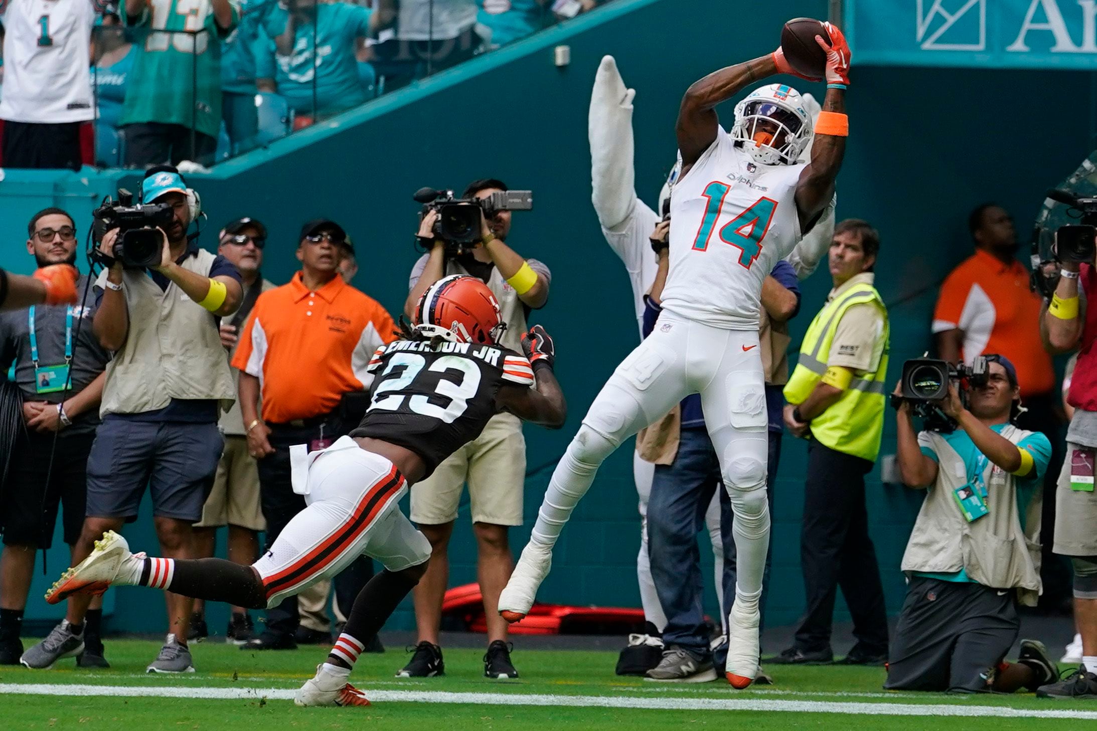 Miami Dolphins fullback Alec Ingold (30) runs with the ball to score a  touchdown during an NFL football game against the Cleveland Browns, Sunday,  Nov. 13, 2022, in Miami Gardens, Fla. (AP