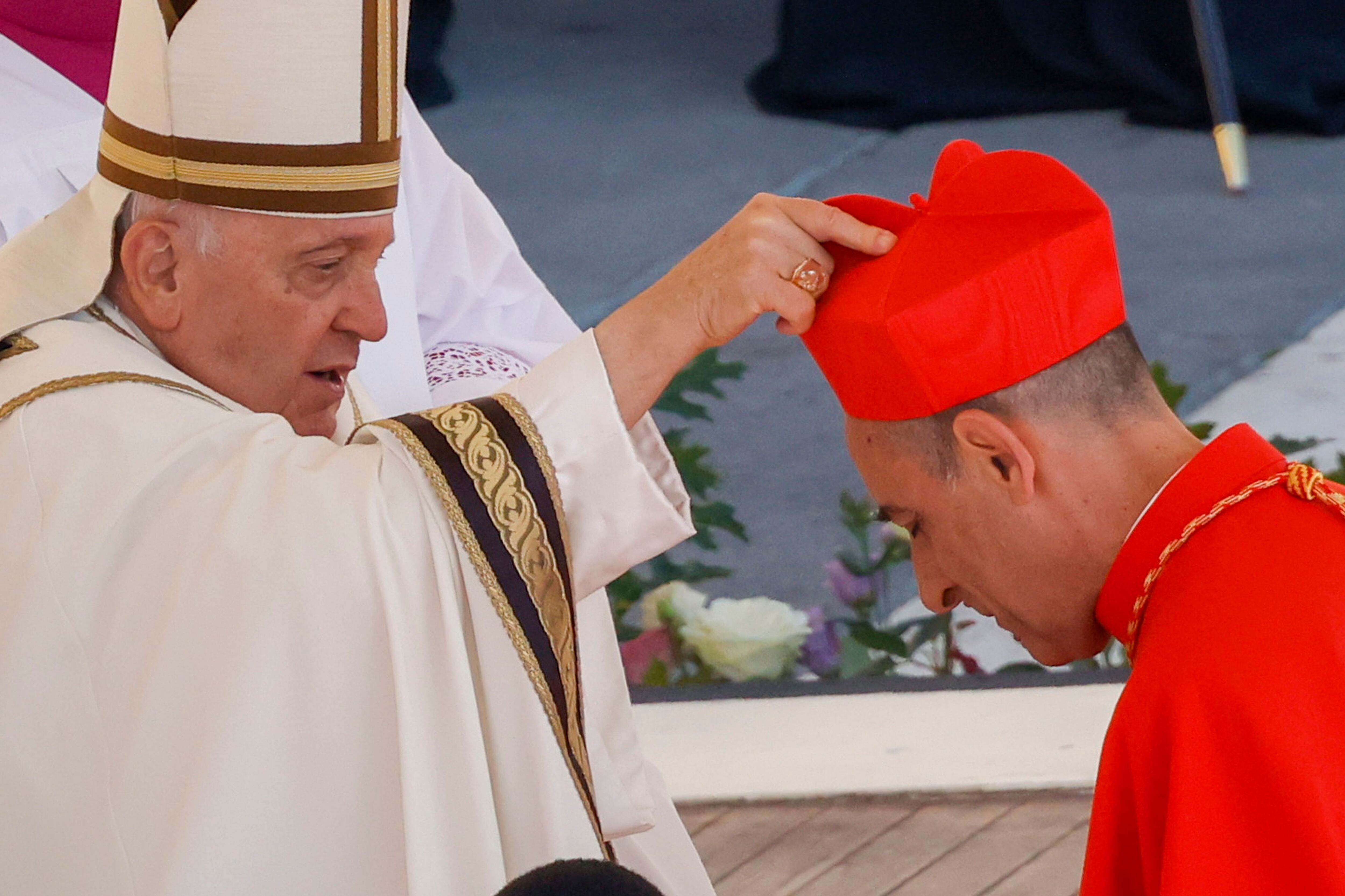 Papal conclave: Why do cardinals wear funny hats?