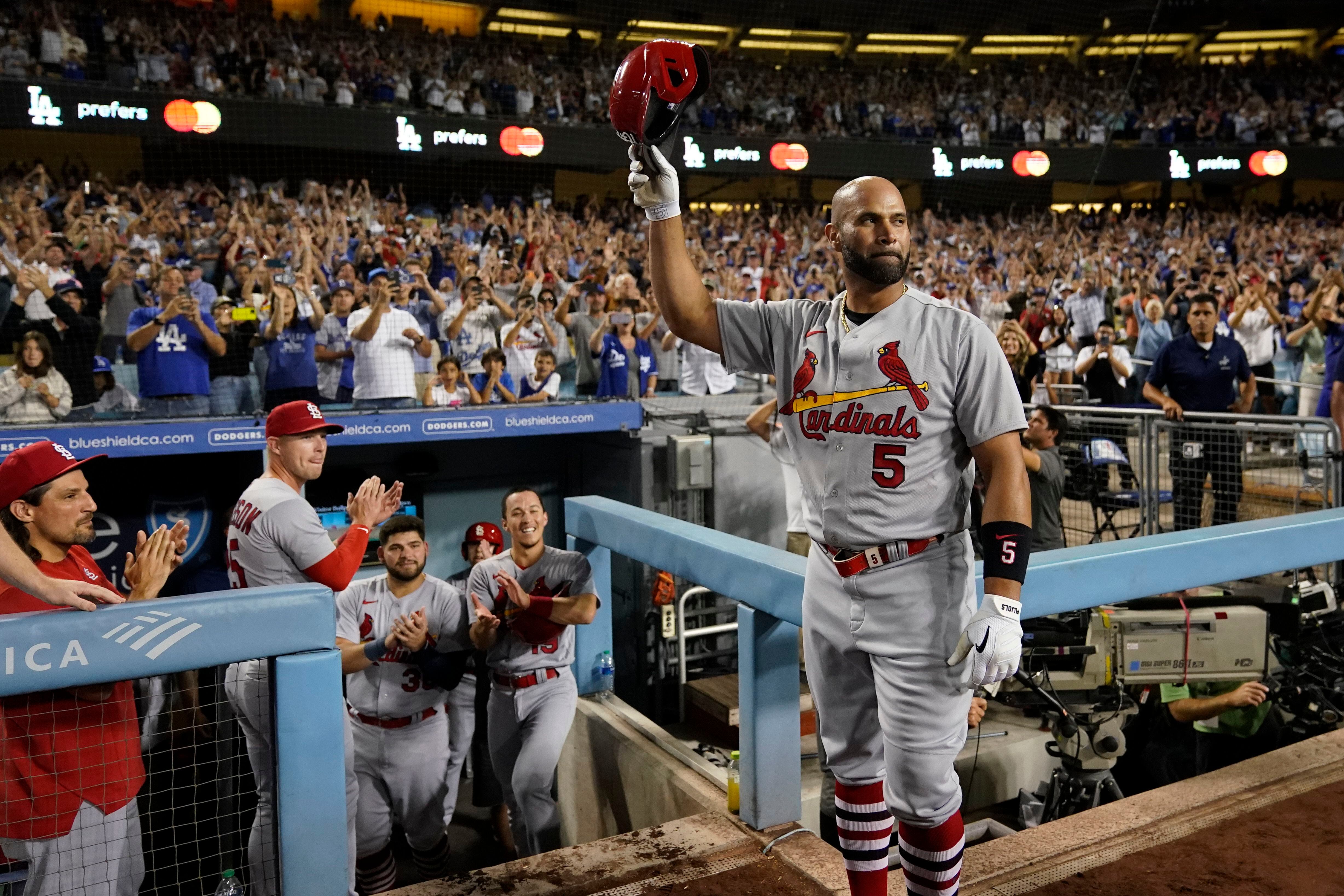 Pujols hits club-record 4th slam in Cards' win