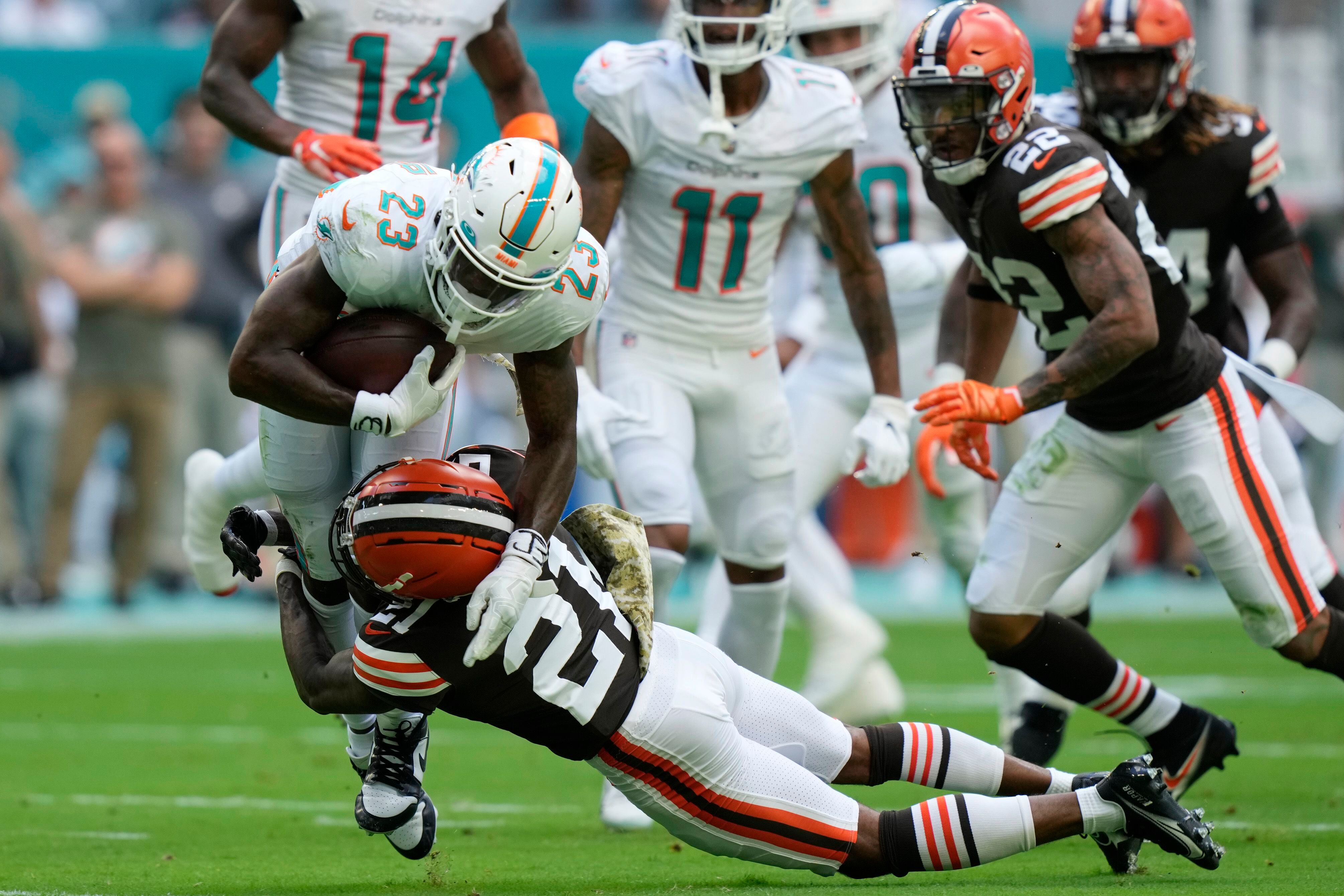 Miami Dolphins fullback Alec Ingold (30) runs for a touchdown during the  first half of an NFL football game against the Cleveland Browns, Sunday,  Nov. 13, 2022, in Miami Gardens, Fla. (AP