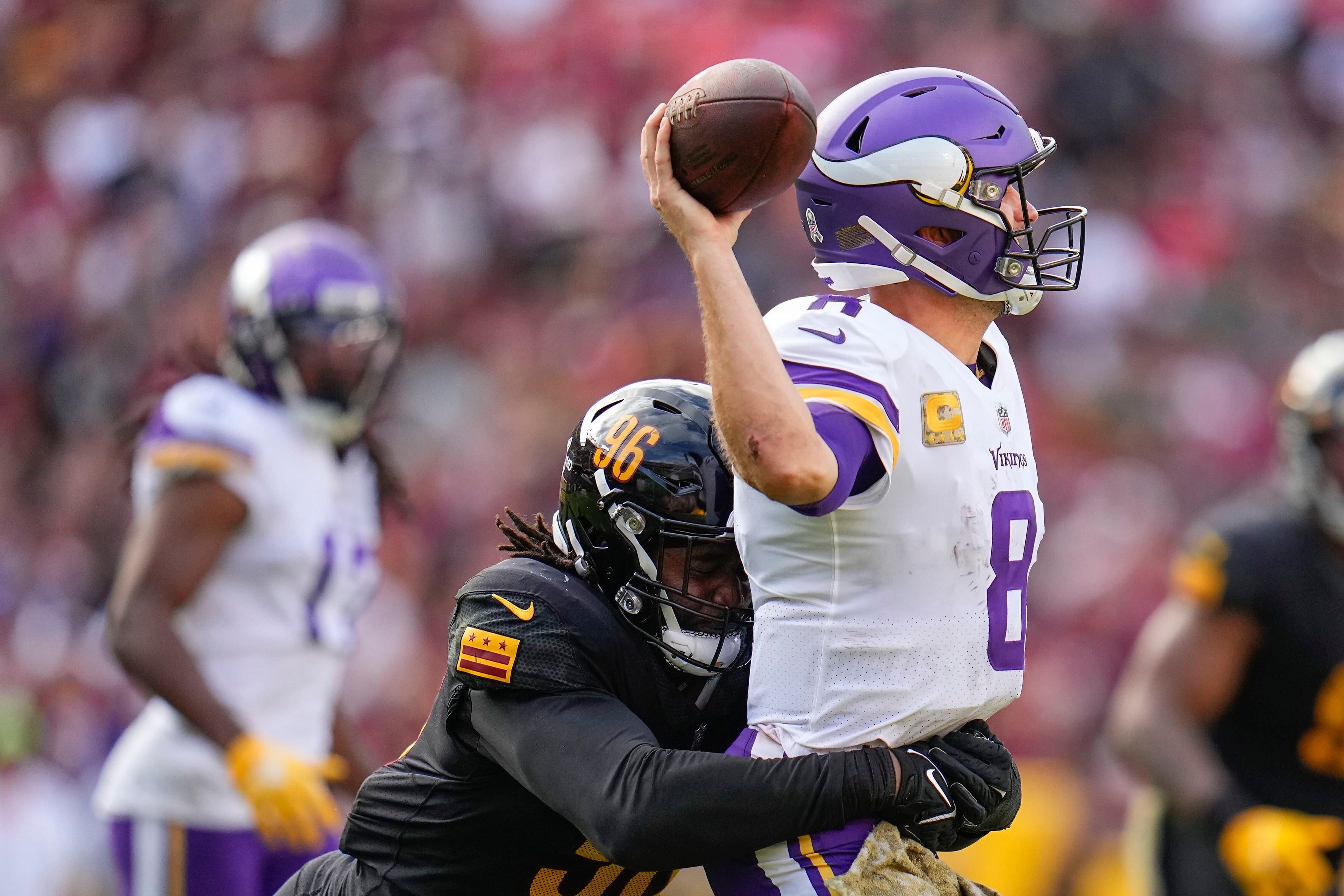 Iced-out Kirk Cousins celebrates Vikings 20-17 win over Commanders