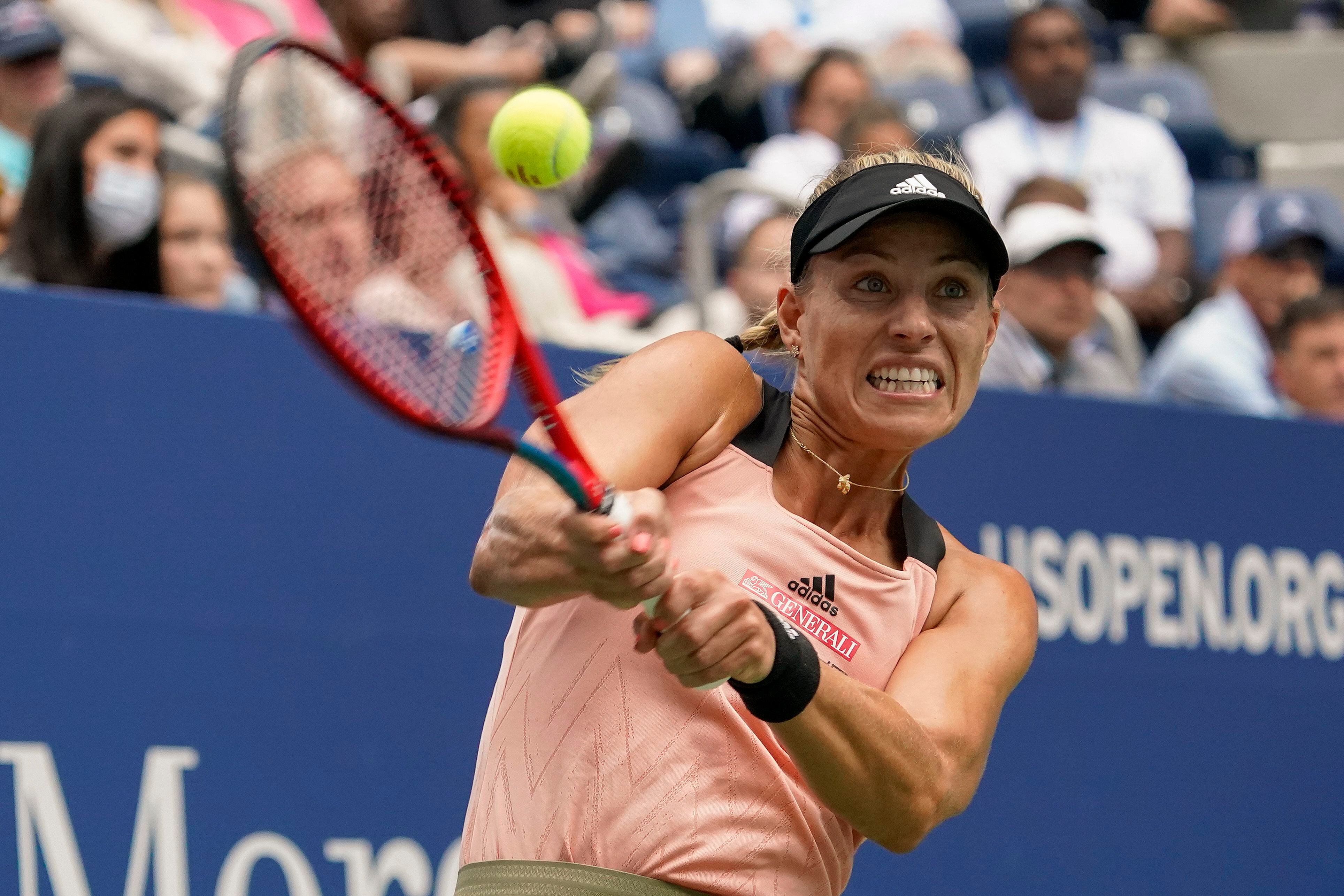 Serena Williams throws her racket after losing the second set tiebreak to  Victoria Azarenka of Belarus in the Woman's Final in Arthur Ashe Stadium at  the U.S. Open Tennis Championships at the