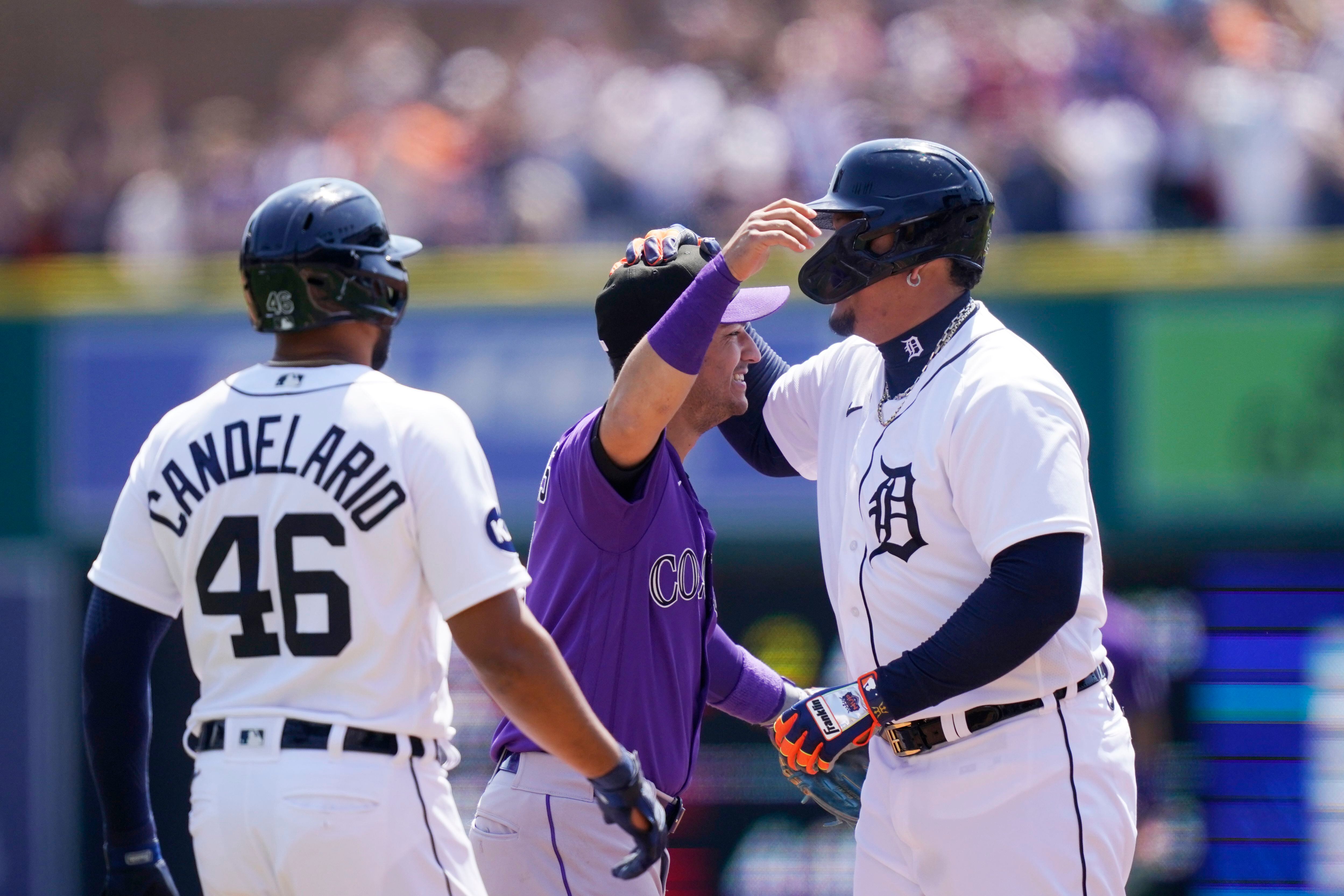 Detroit Tigers designated hitter Miguel Cabrera kisses his son