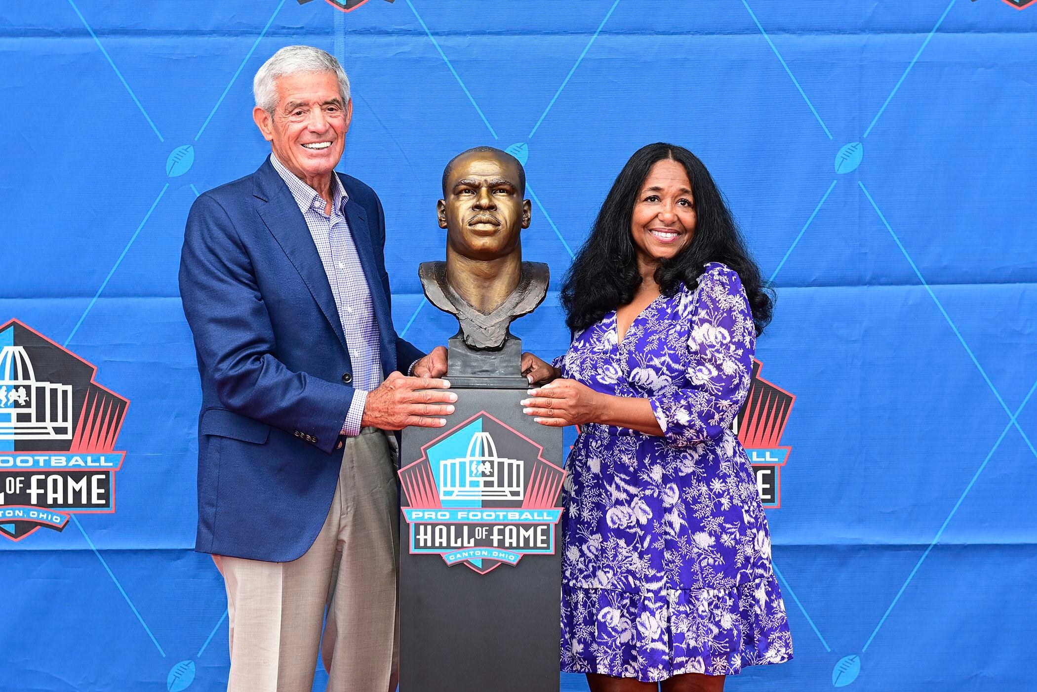 Former Jacksonville Jaguars offensive tackle Tony Boselli, center, stands  with members of his family after a ceremony, where he was presented with  his Pro Football Hall of Fame ring and had his