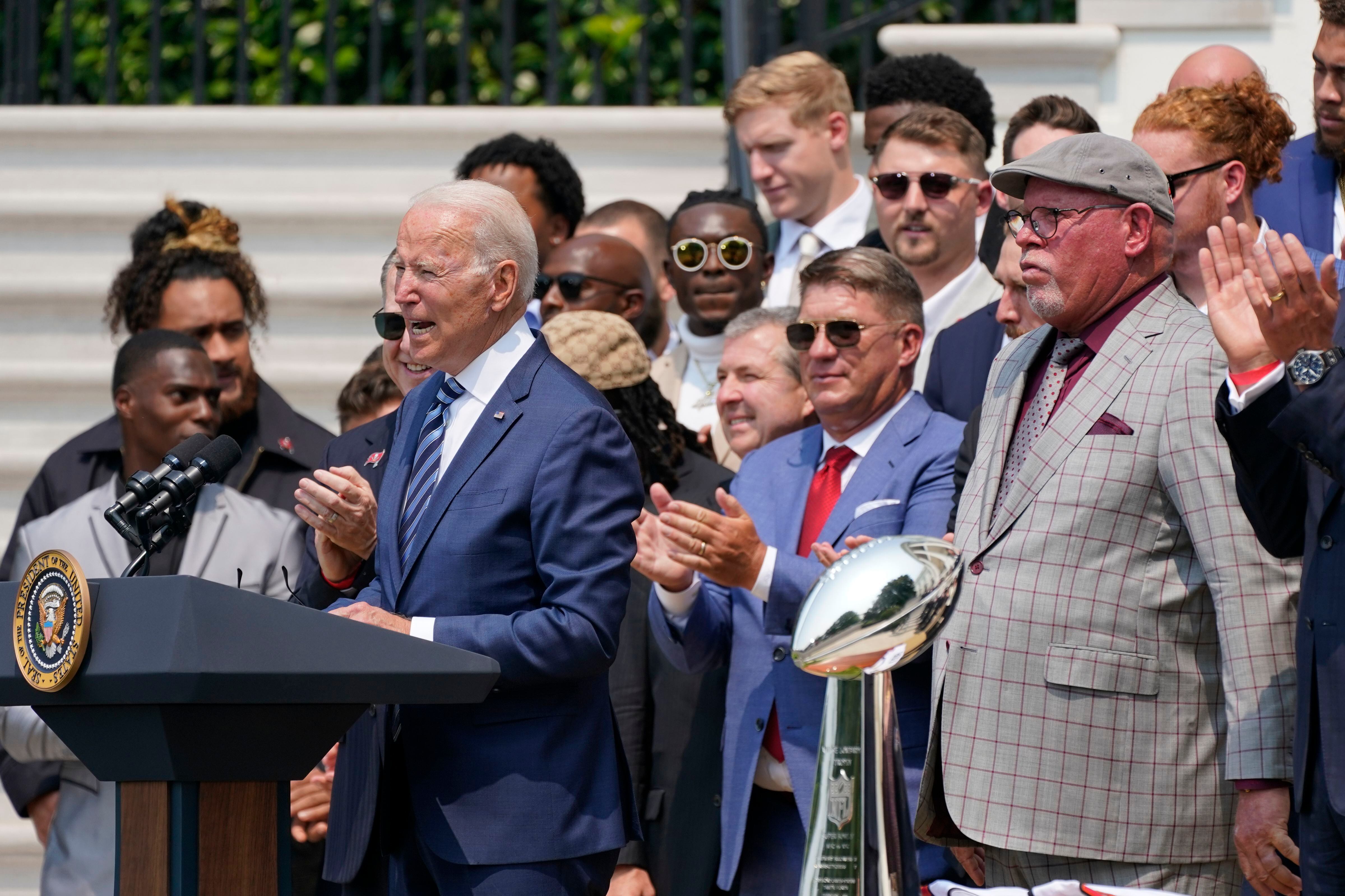 Washington, United States. 20th July, 2021. U.S. President Joe Biden, holds  a number 46 jersey handed to him by Super Bowl Champions Tampa Bay  Buccaneers owner Bryan Glazer, on the South Lawn