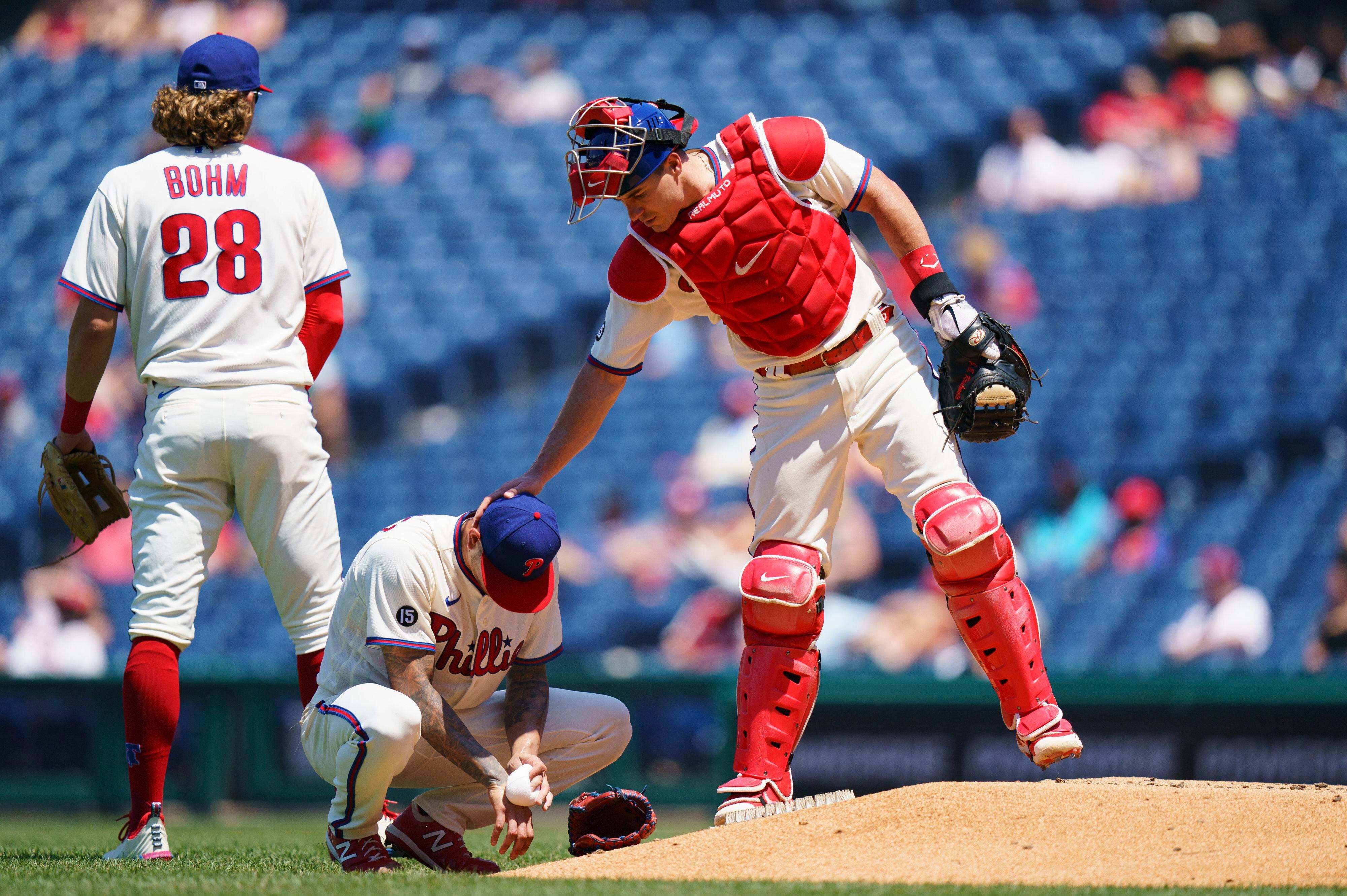 Phillies catcher Realmuto leaves after foul tip to mask