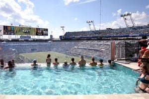 Swim in a pool while you watch an NFL game in person 